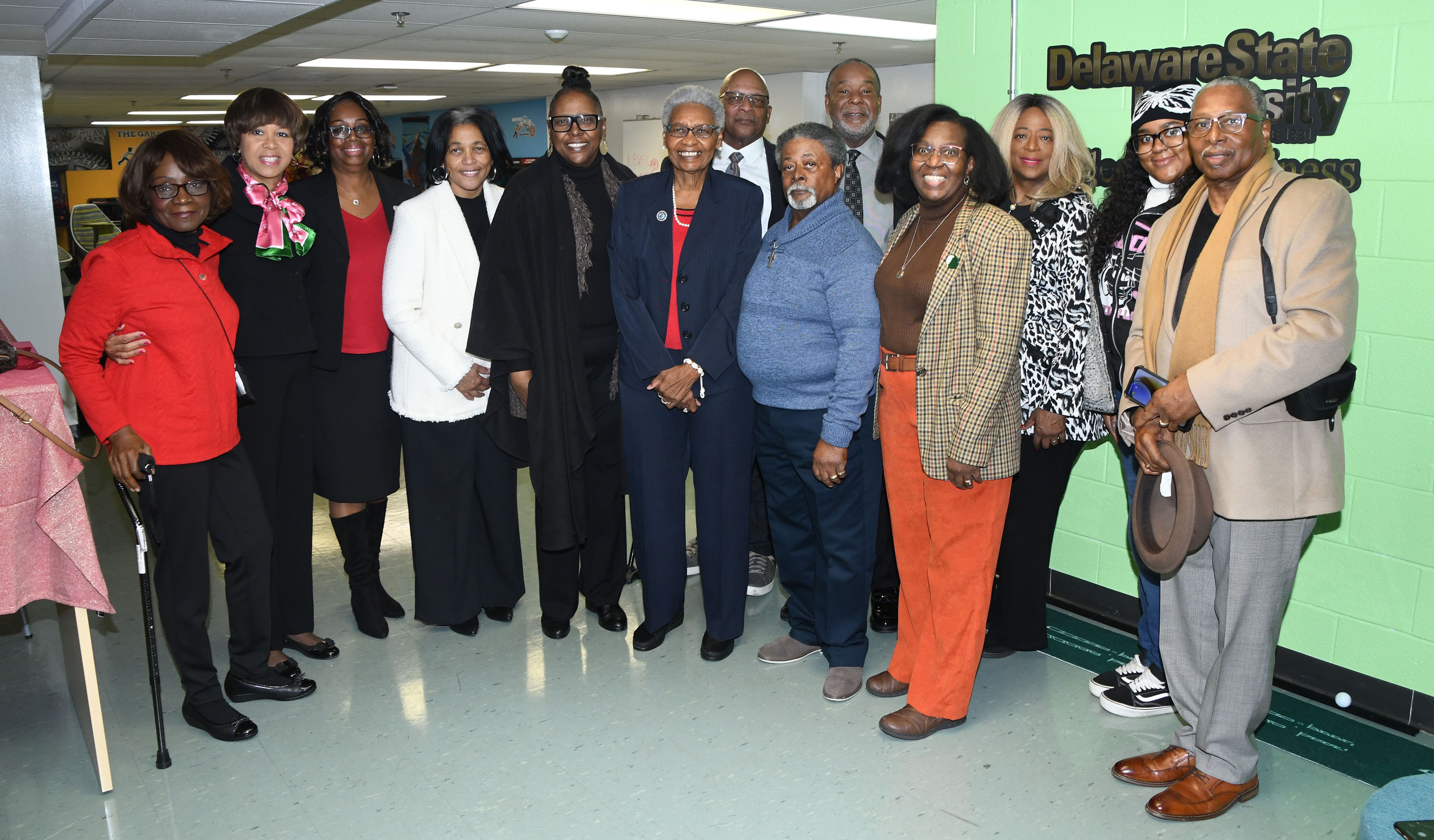 Dr. Marlene Saunders poses with family and friends after being sworn at the newest member of the DSU Board of Trustees.