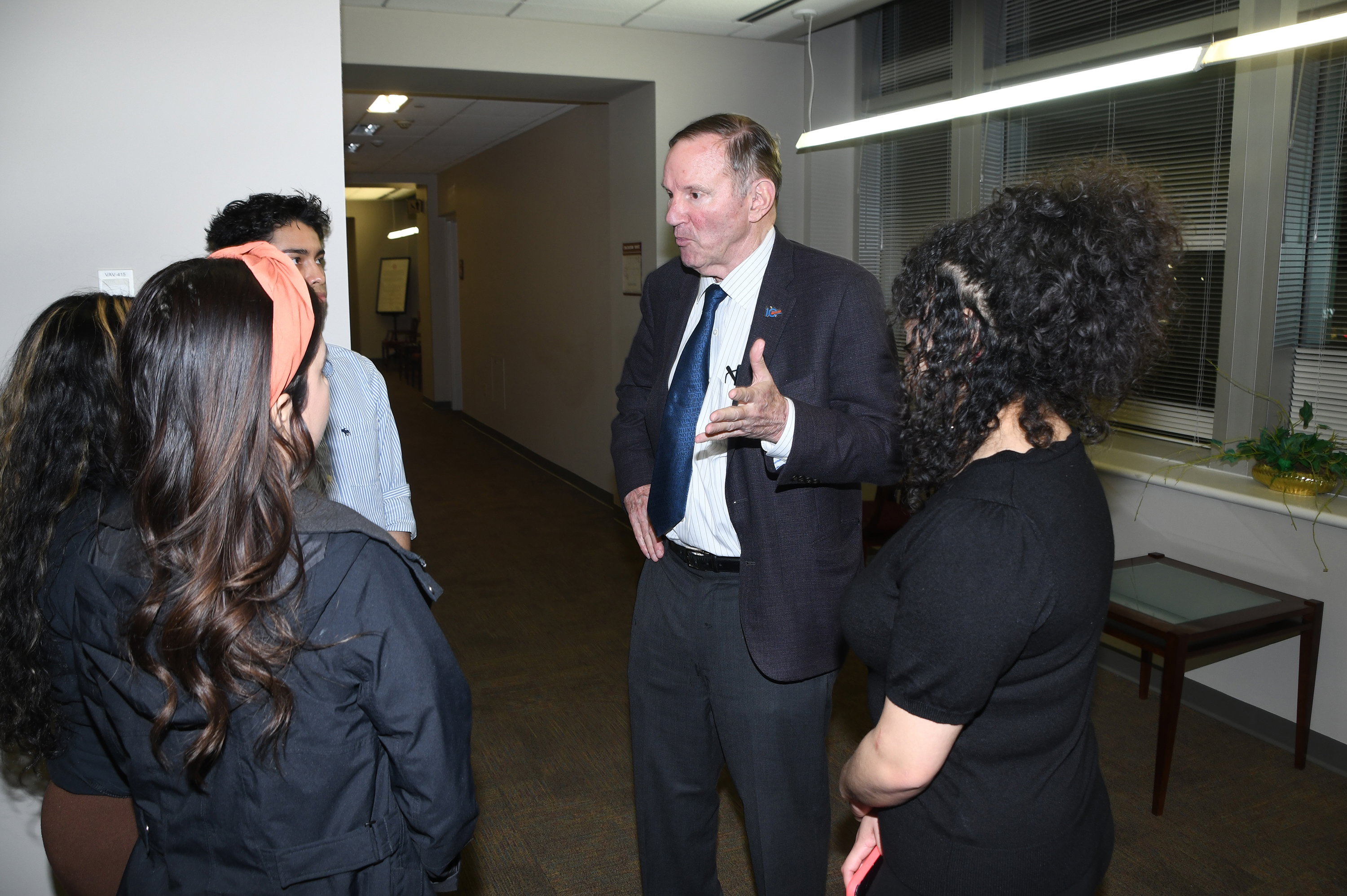 Don Graham chats with some Dreamers during his DSU visit.