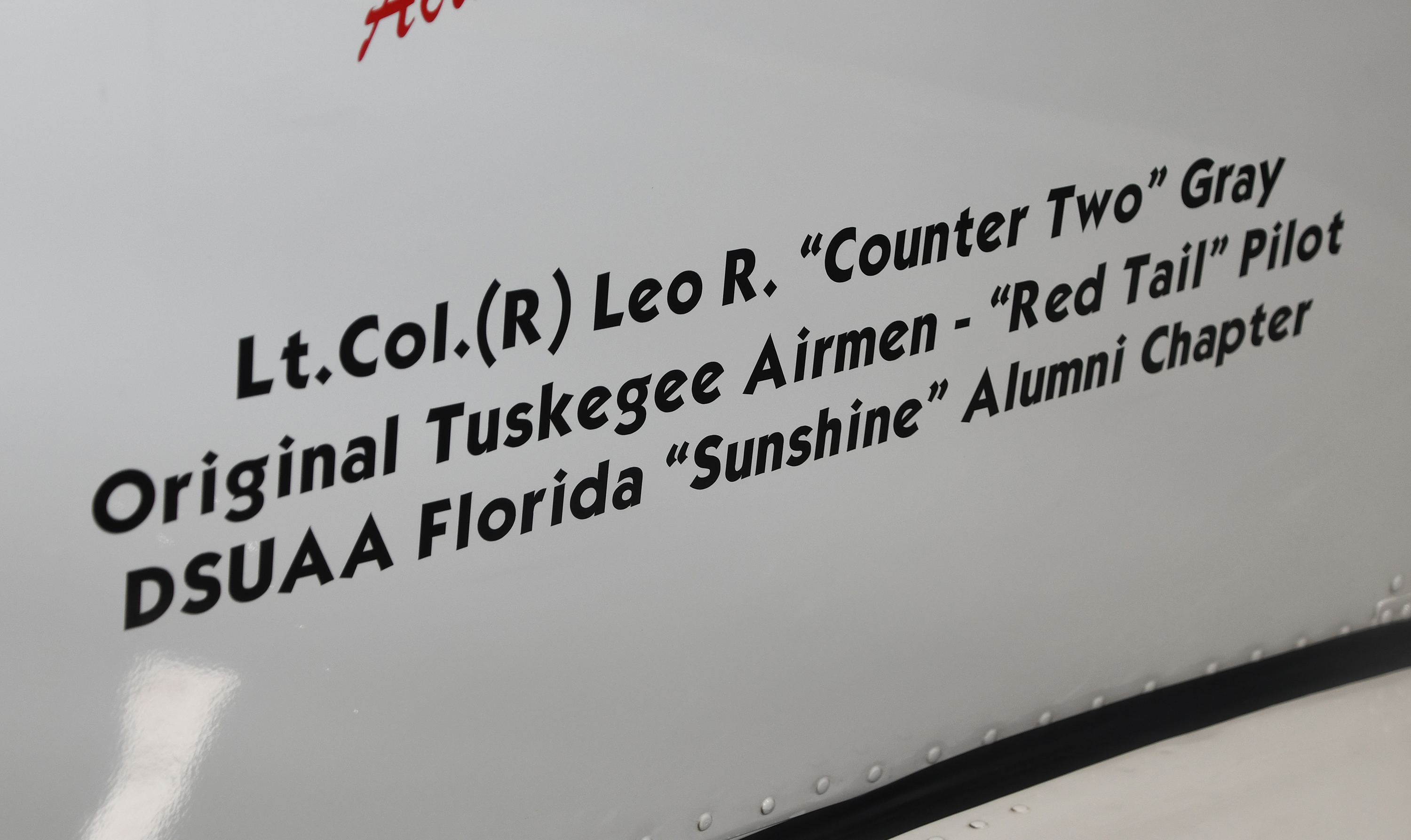 The inscription now written on the plane in honor of Tuskegee pilot Lt. Col. Leo Gray.