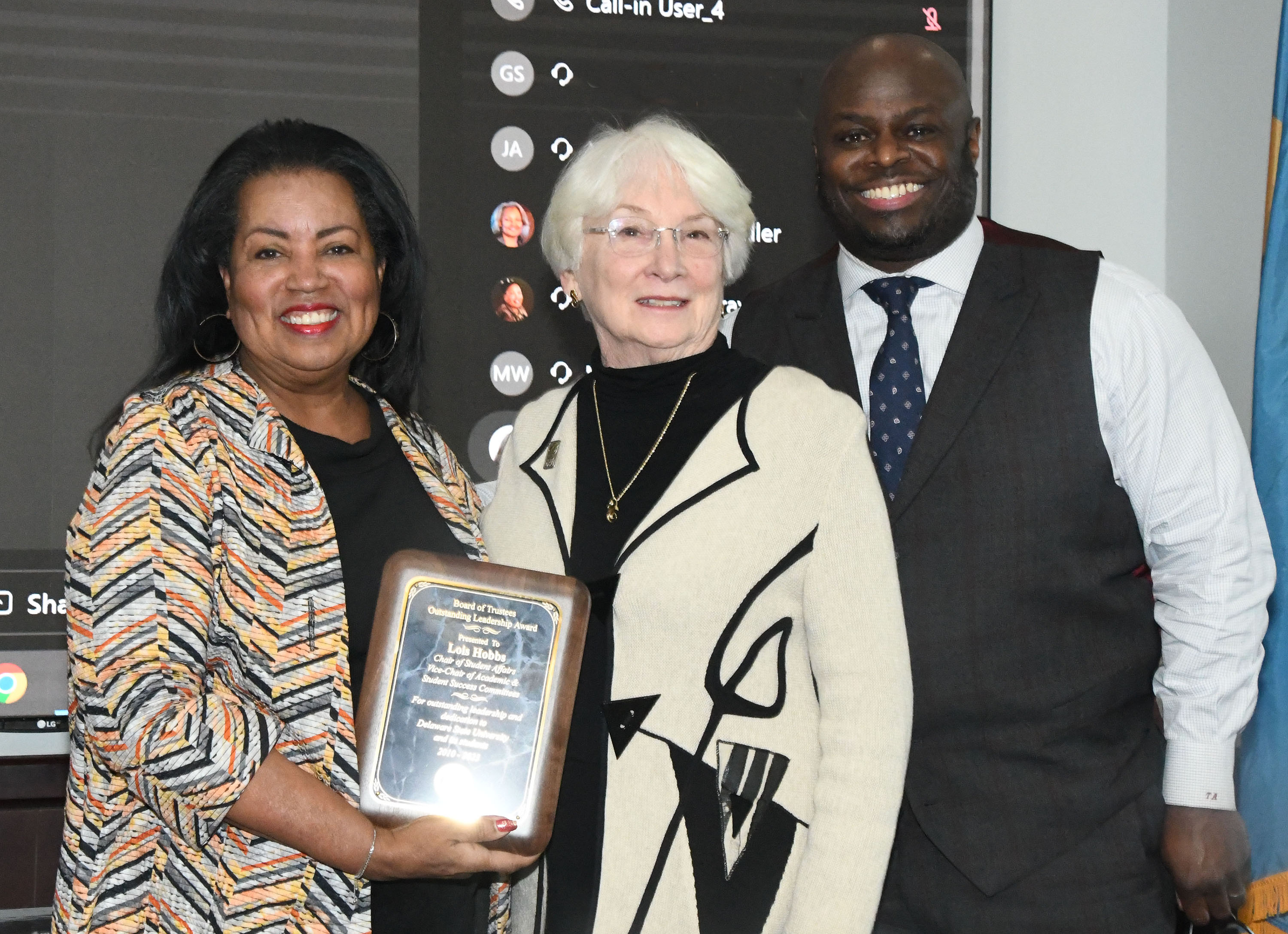 Dr. Devona and Dr. Tony Allen present outgoing Trustee Lois Hobbs with the Outstanding Leadership Award.