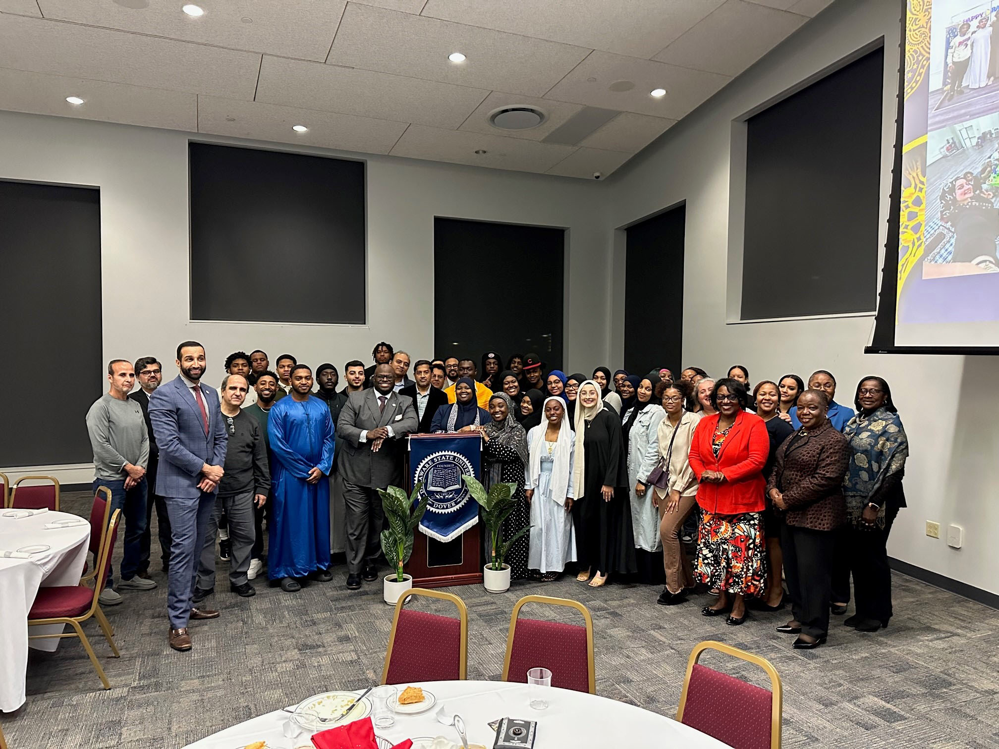 Many of the Ramadan event attendees gathered for a group photo.