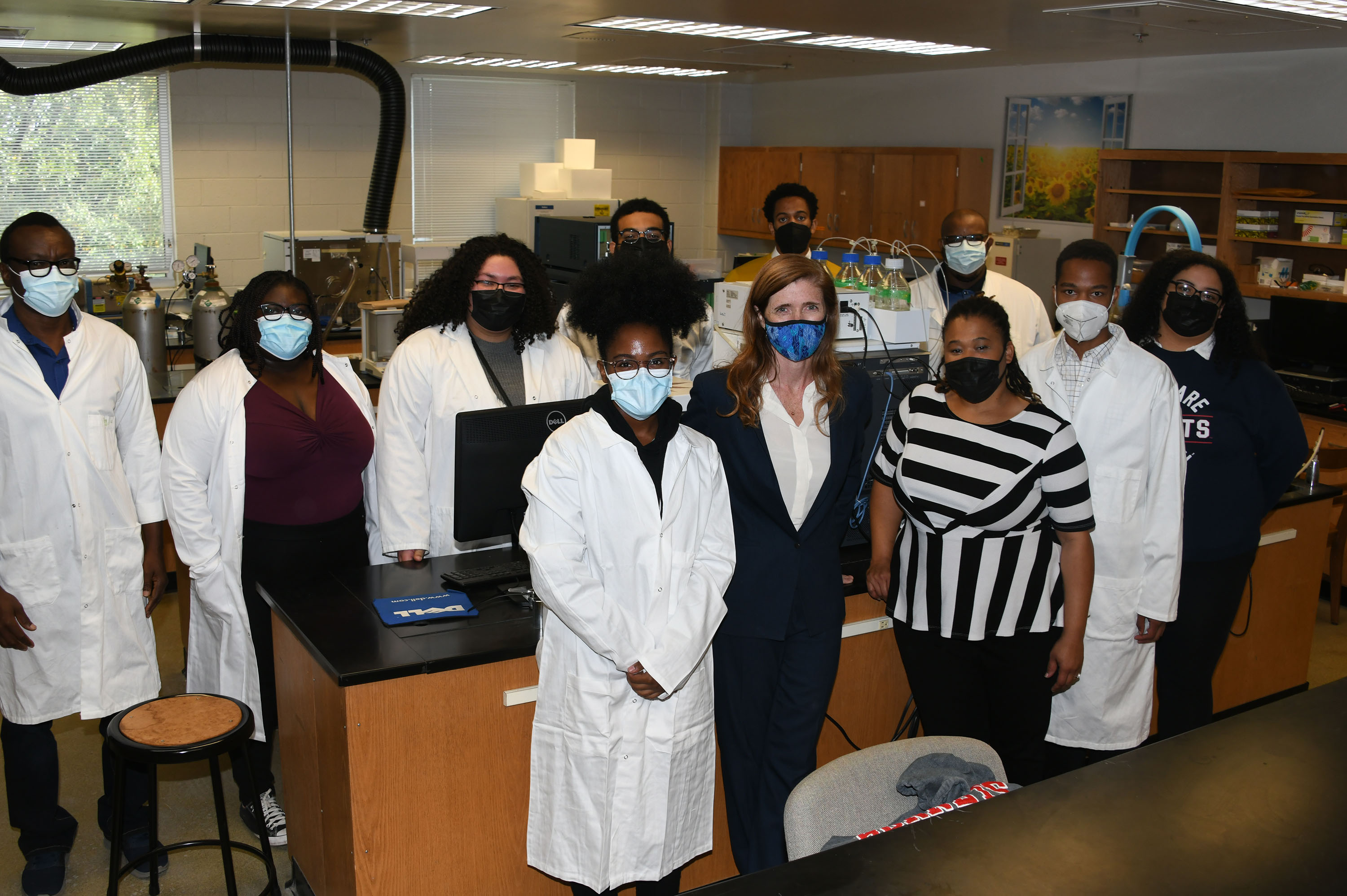 Samantha Power (in front) stopped by the Water Analysis Lab and met chemistry students.