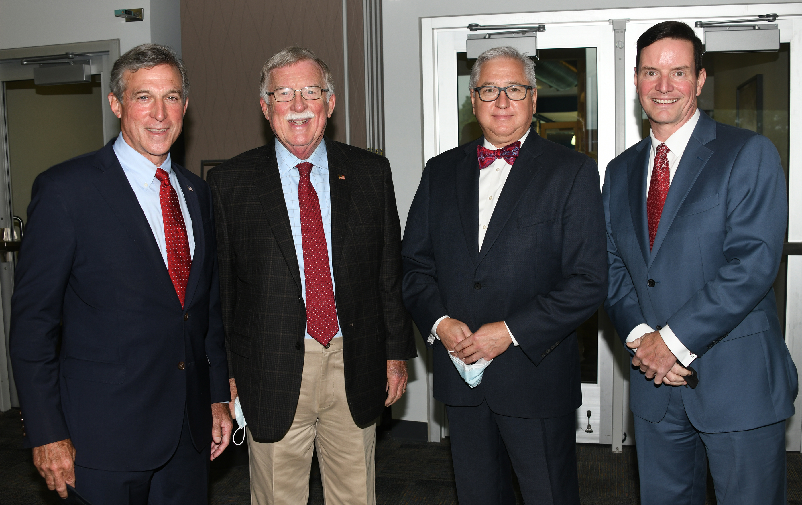 Gov. John Carney with Inspire legislators past and present, Sen. Brian Bushweller, Rep. Darryl Scott and Sen. Trey Paradee.