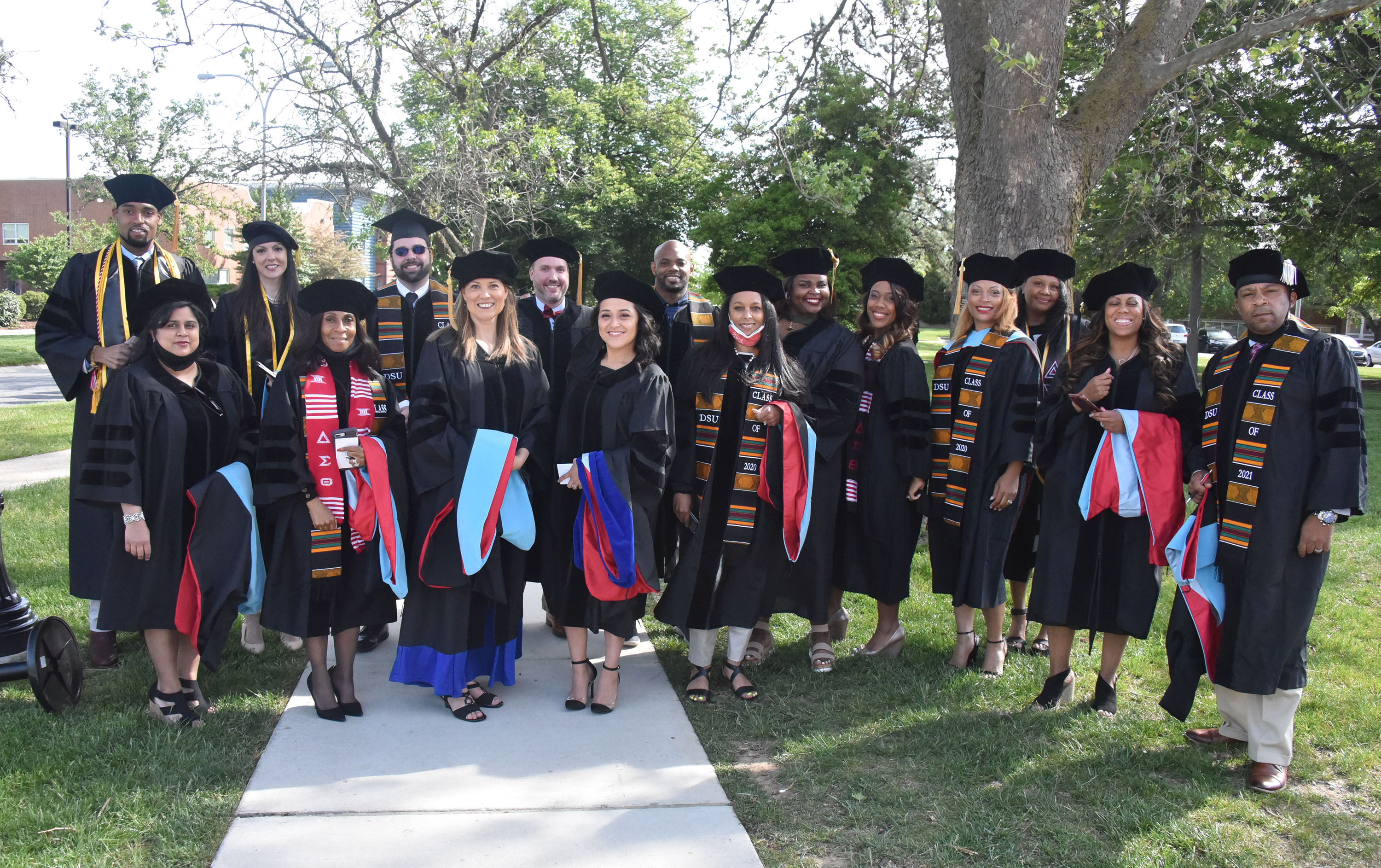 Some of the doctoral graduates gather for a group shot before their May 7 Commencement.