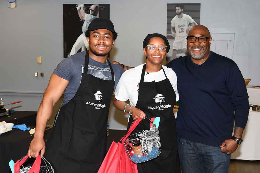 (L-r) Langston Staton and Crystal Lacy, posing along with Celebrity Chef G. Garvin, won the first-ever Sodexo Magic Cooking Competition held April 6 at the Conrad Hall dining facility.