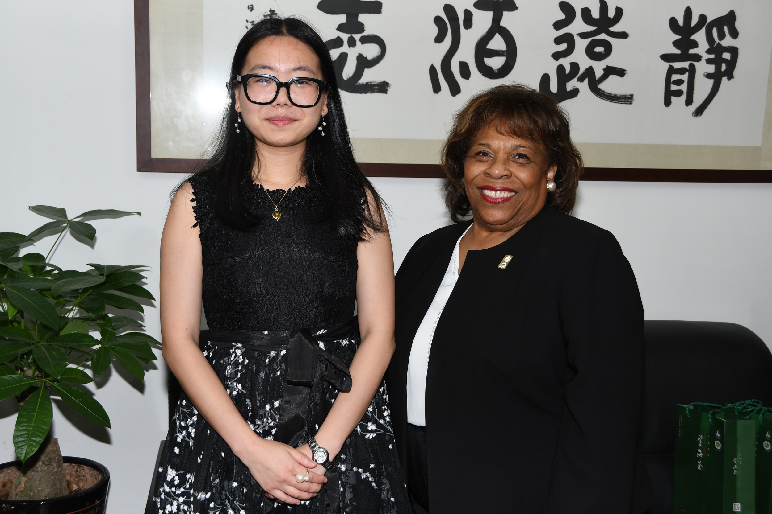 Dr. Wilma Mishoe poses with Chen Tong, a 2011 graduate of the joint Accounting Program. She is now an NBUT assistant professor.