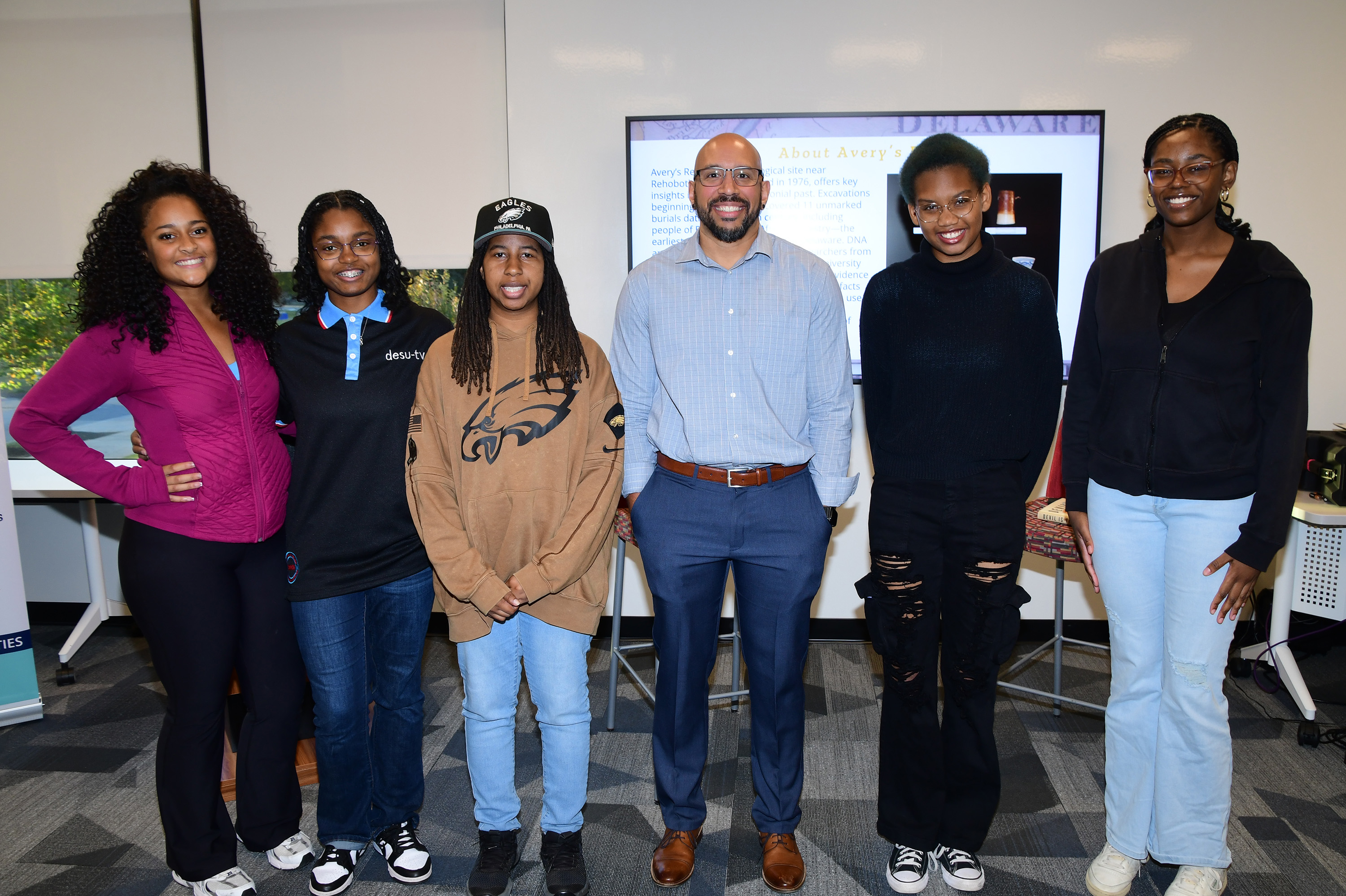 Author John Vercher does a phone moment with a group of DSU students who attended  the event.