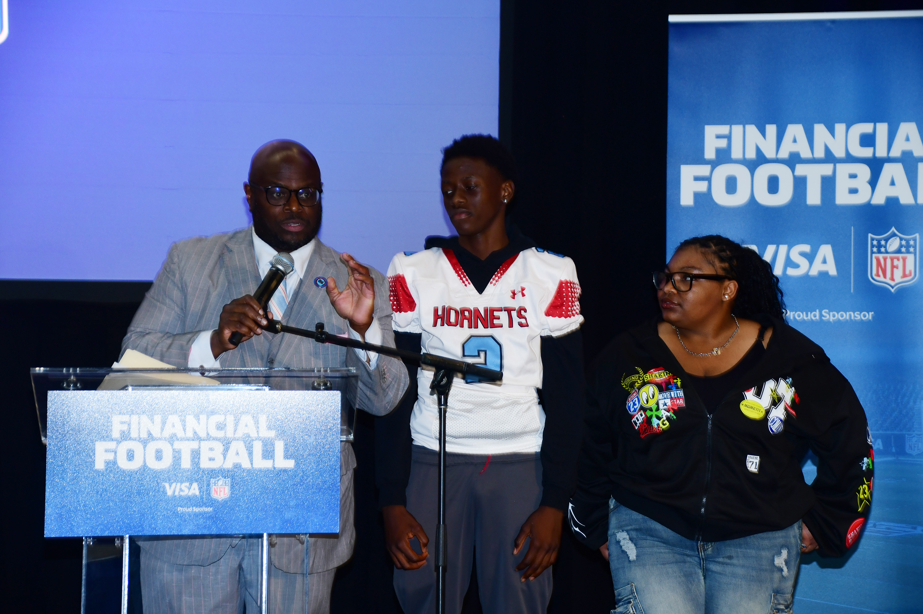 DSU President Tony Allen uses two Early College School students to explain the full INSPIRE impact of Senate Bill 90,