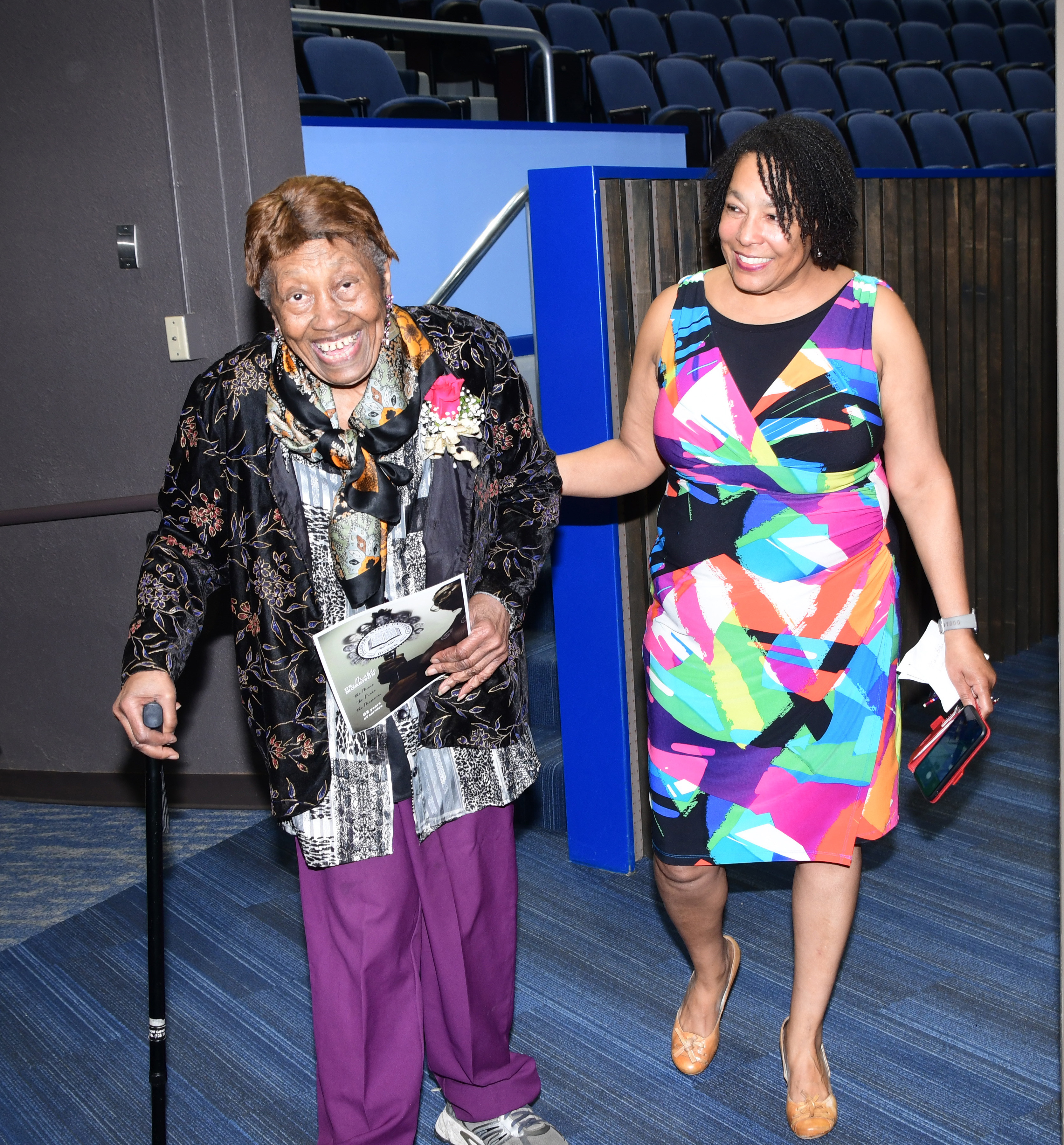 Dr. Mable Morrison is escort into the theatre by Lori Crawford, Associate Professor of Art.