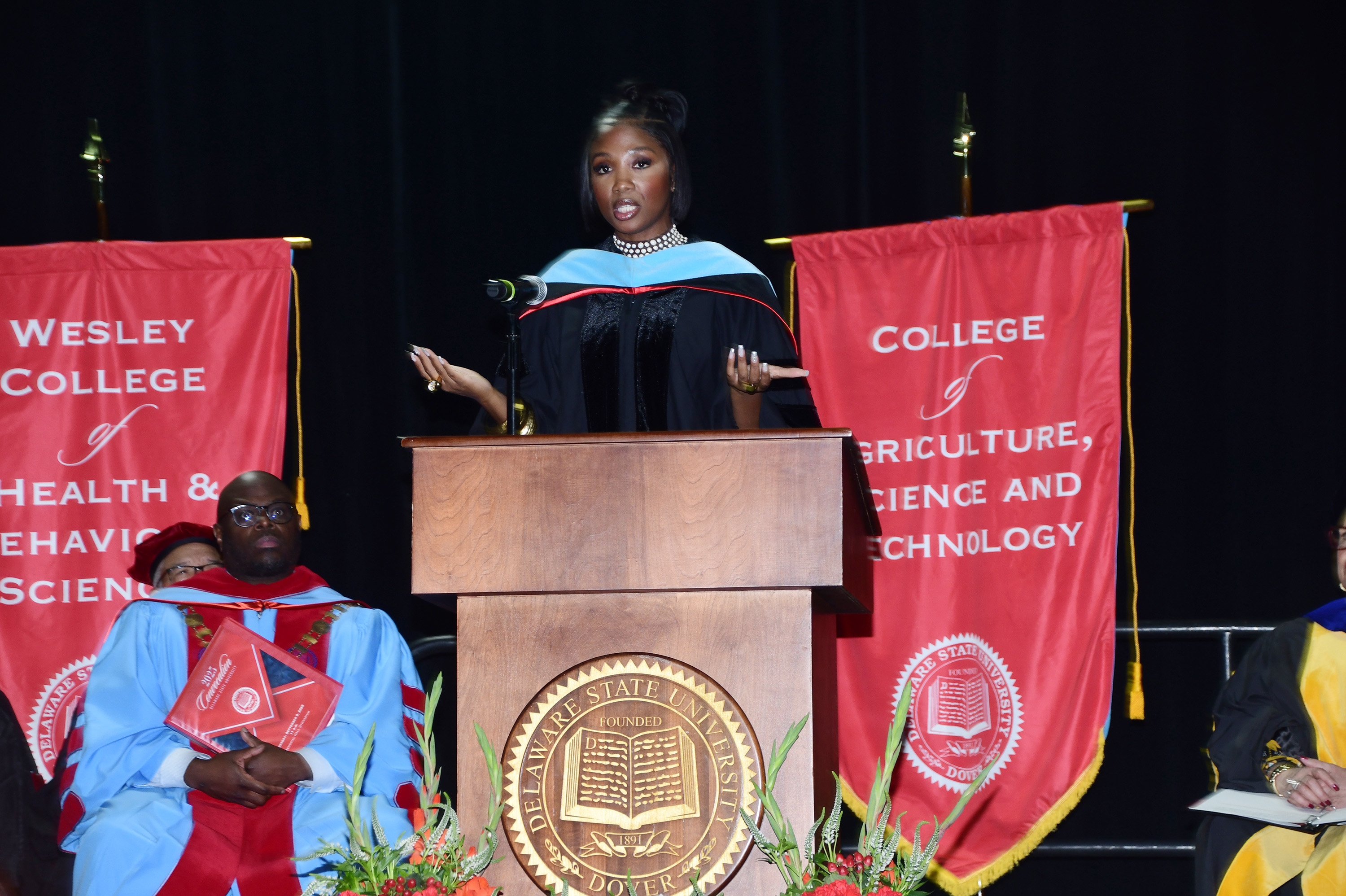 DSU alumna Loren LoRosa gave the keynote address, urging the students to maintain their ties with DSU peers thru life.