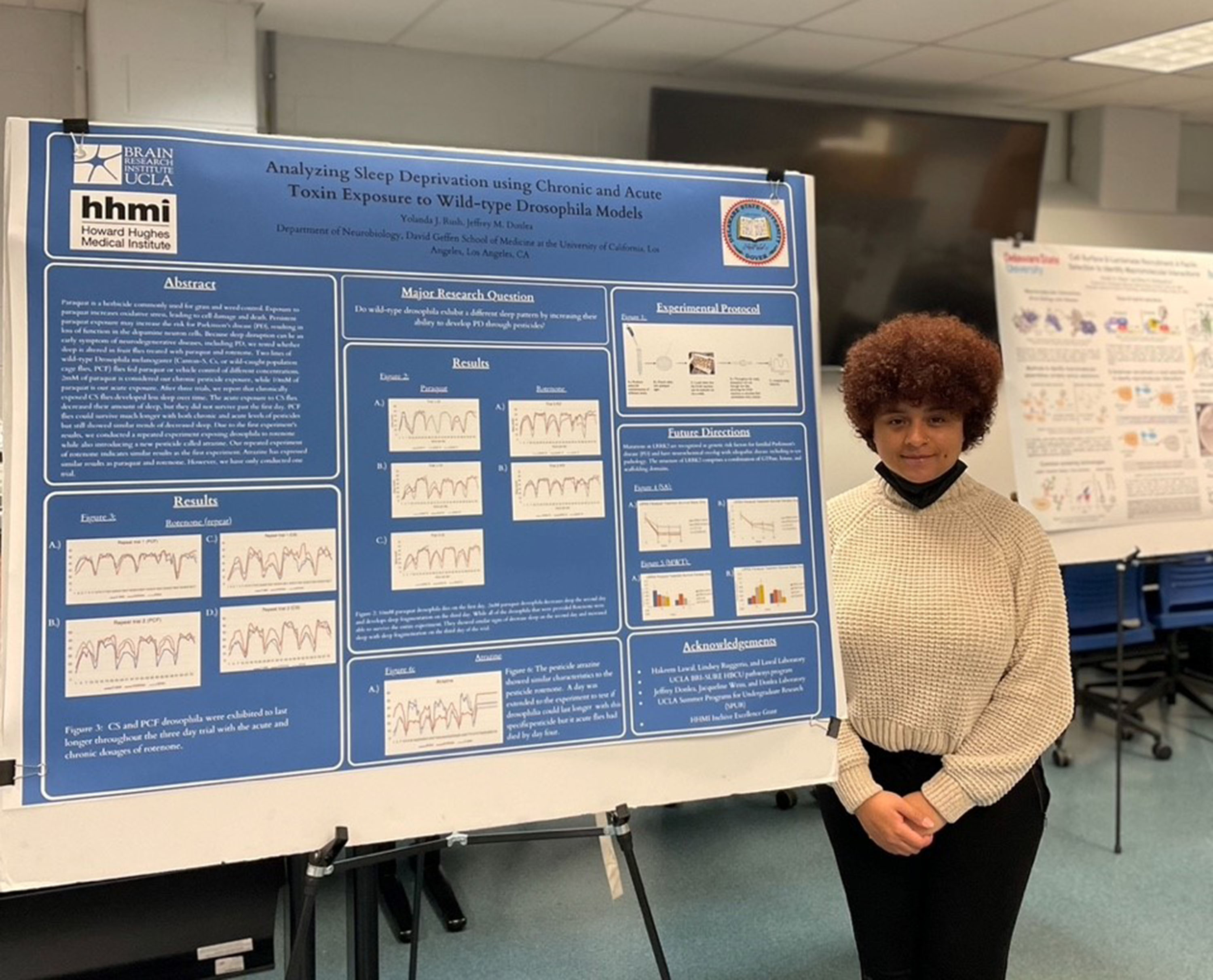 Junior Biological Science major Yolanda Rush shows her research on sleep deprivation.