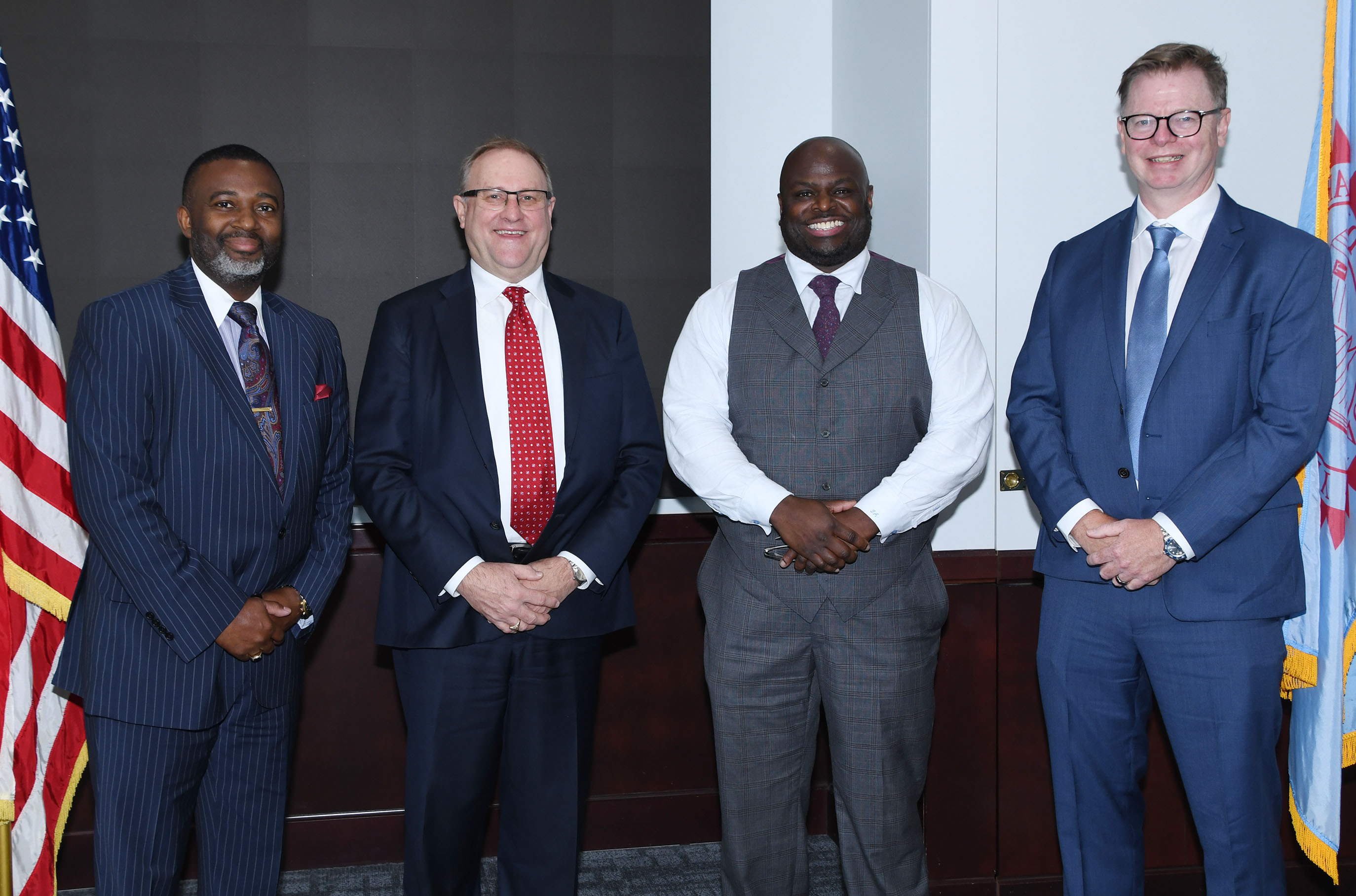 University President Tony Allen stands with Agilent's Greg MacKenney, CEO Mike McMullen, and Padraig McDonnell.