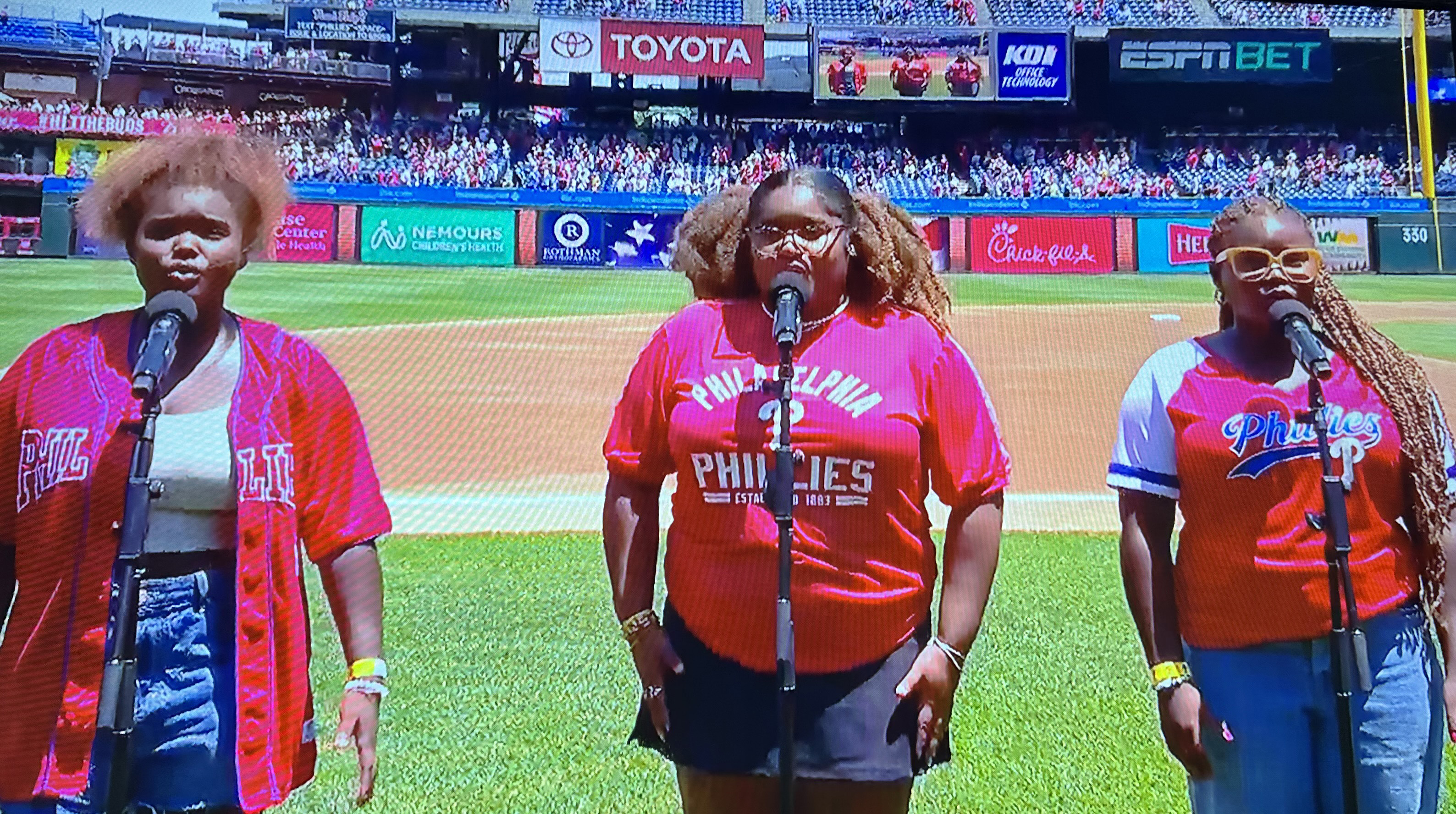 DSU Concert Choir member Yancy Hollis (center) was joined by her sisters Madison and Makaya in singing the National Anthem.