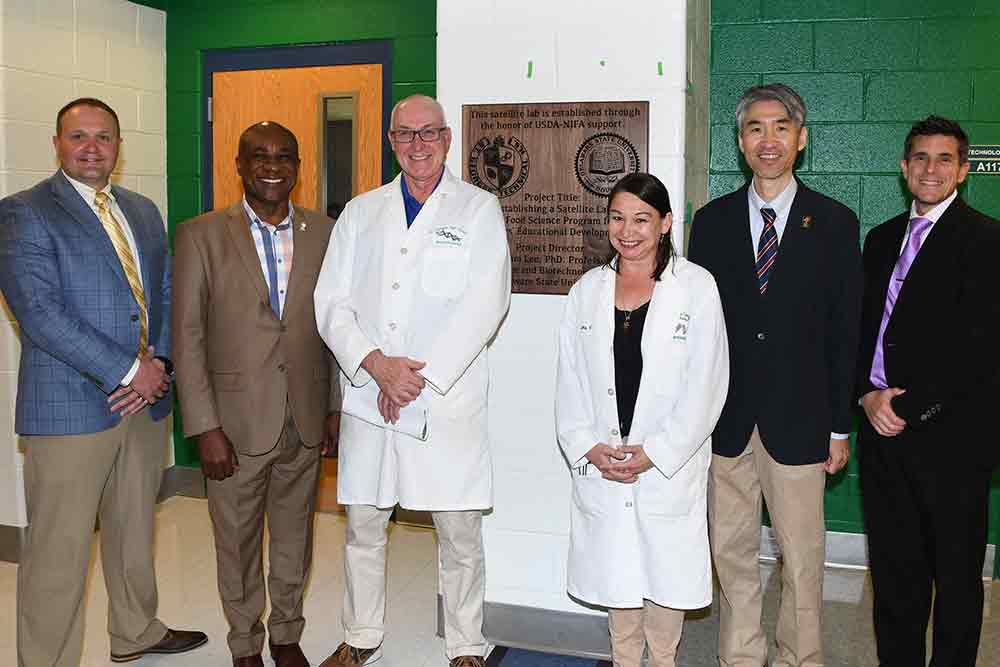 St. Georges and University officials celebrated the new Satellite Lab