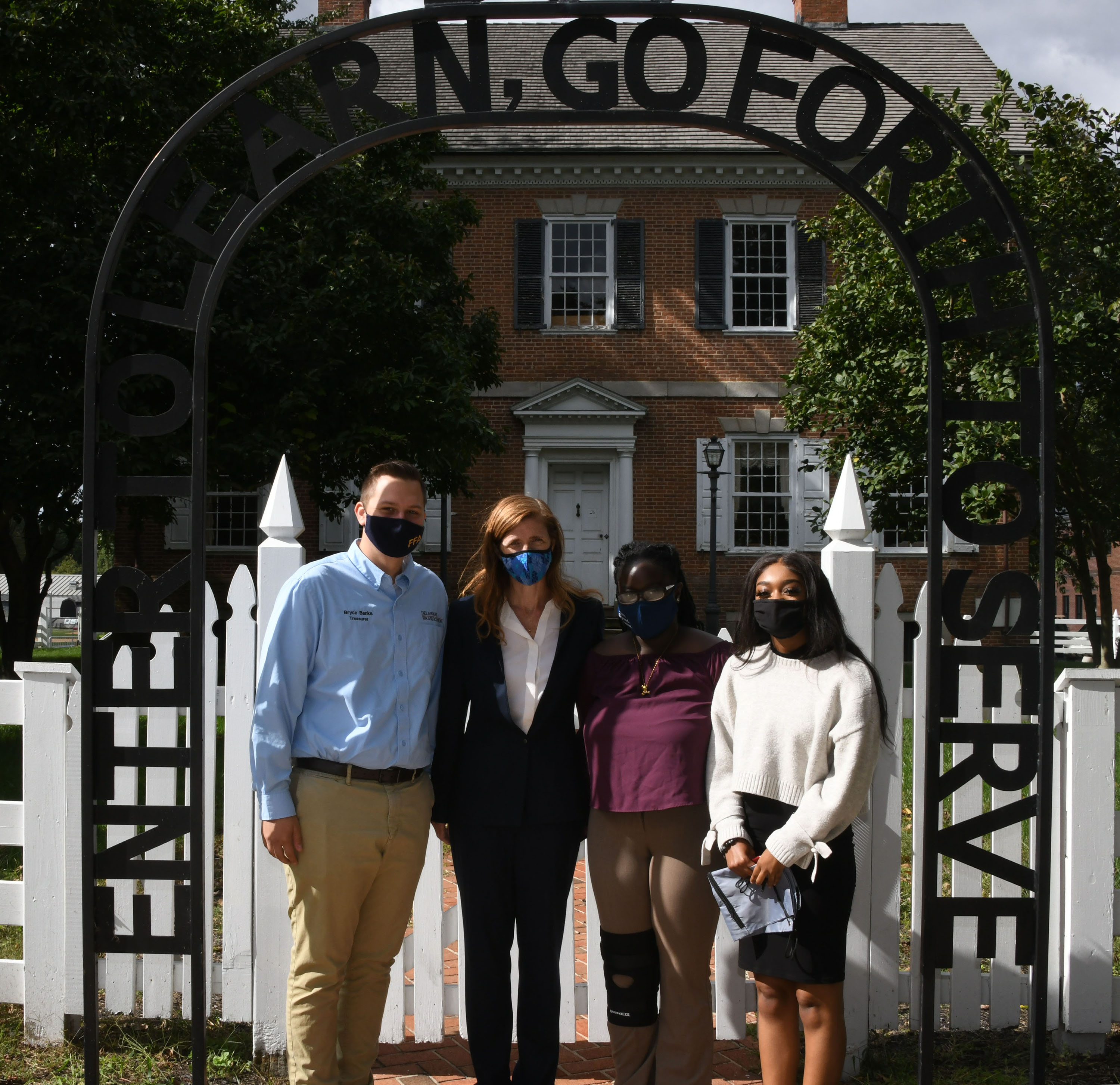 Samantha Power, with several students, visited Loockerman Hall where she learned about some of the University's history.