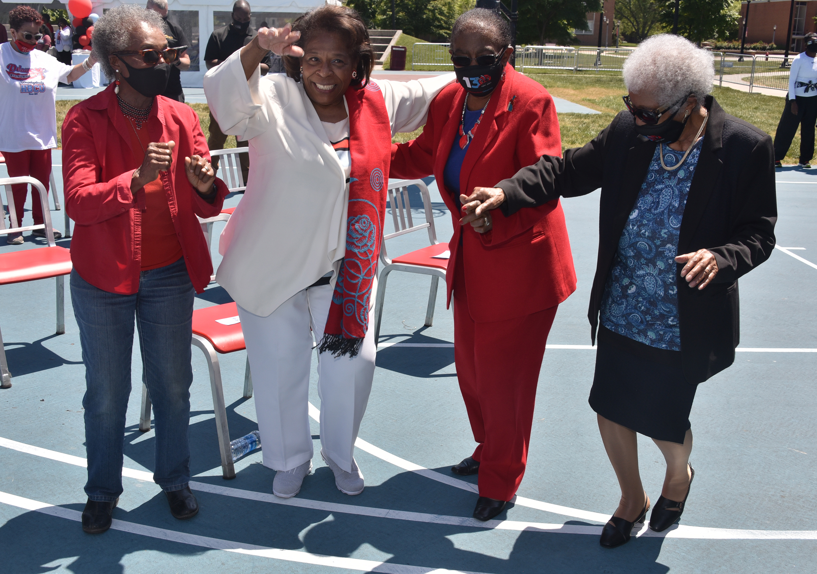 (L-r) Dolores Blakey, Dr. Wilma Mishoe, Dr. Reba Hollingsworth and Del State's oldest alum Susan Browne, 103, dance to the music