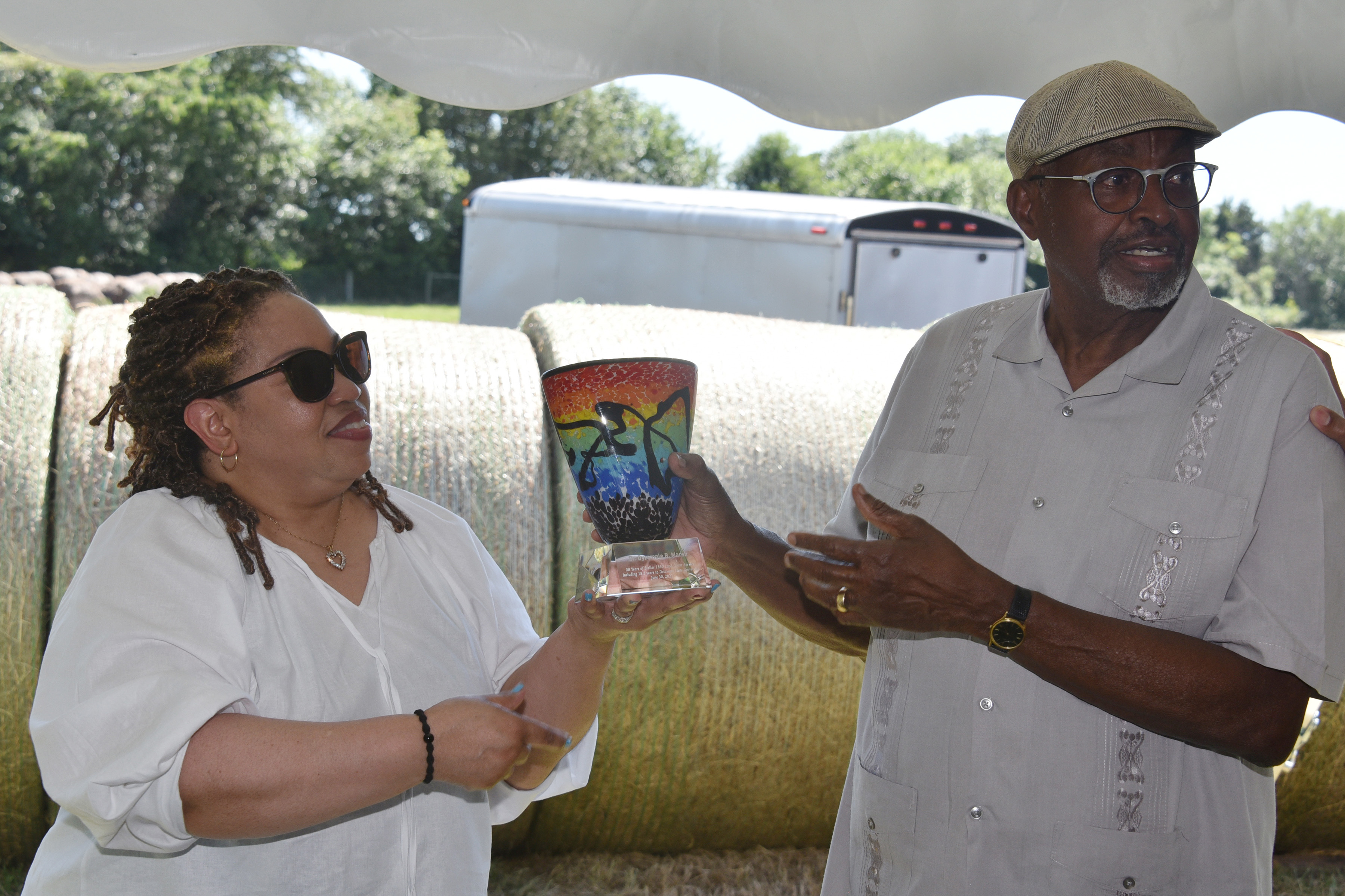 Troy Darden, CAST Information Coordinator, presents a retirement gift to Dr. Marsh