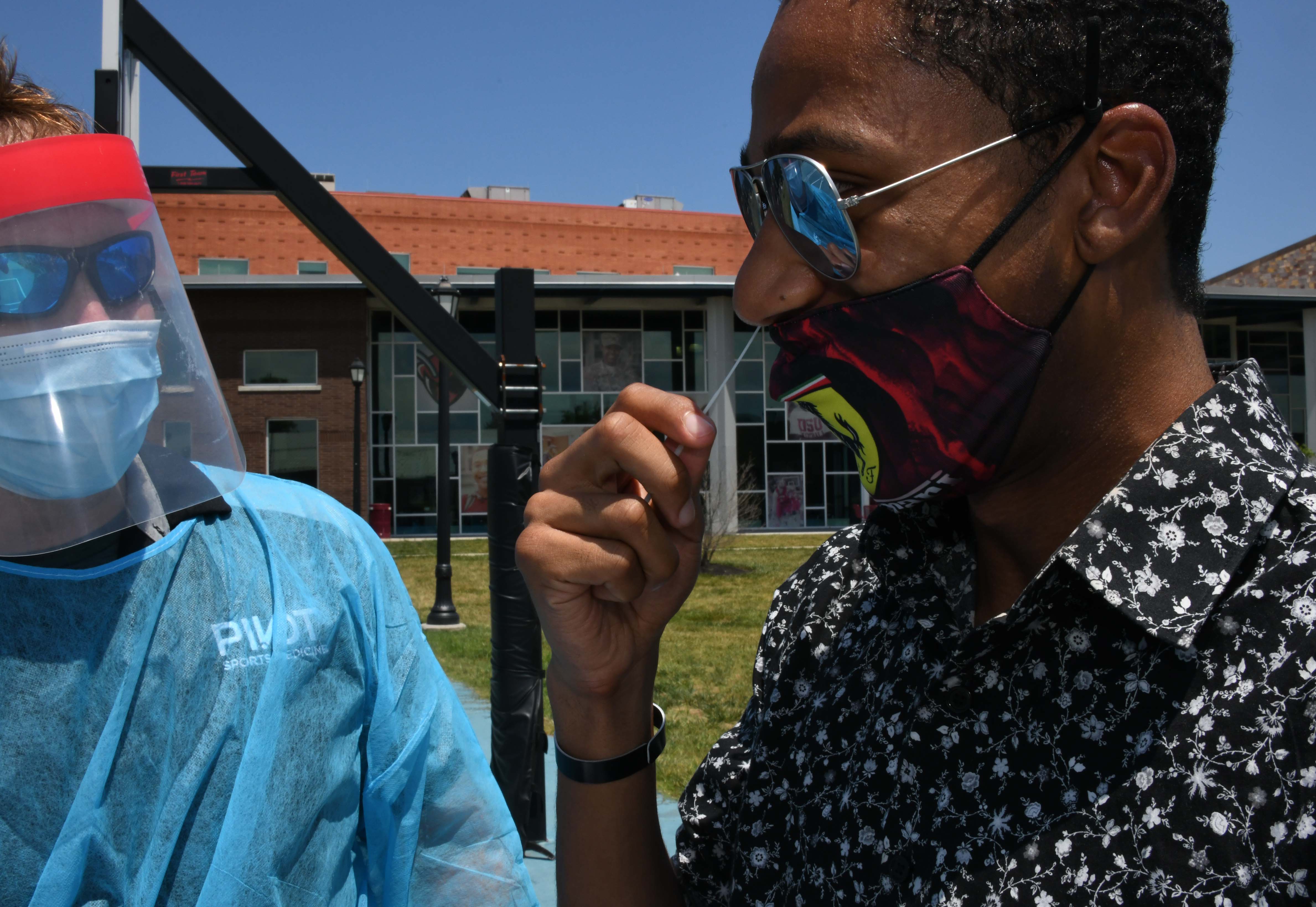 Aviation major Adrian Bobb takes the COVID-19 test.