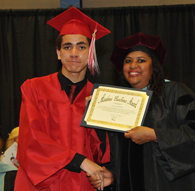 Levi Jordan Anderson, with ECHS' Dr. Evelyn Edney, earn a school high of 77 college credit hours.