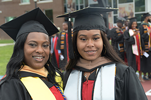 Sherreika Brown, who received a MSW degree, graduated with her daugher, who earned a BS degree in management.