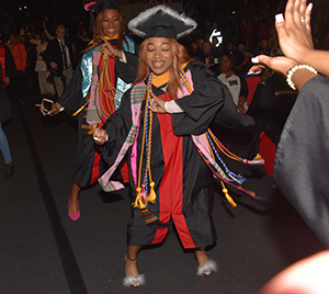 Crystal Gonzalez celebrates her diploma with a dance. 