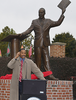 Joseph Holland said his father's life was characterized by "dreams, diligence, determination and destiny."