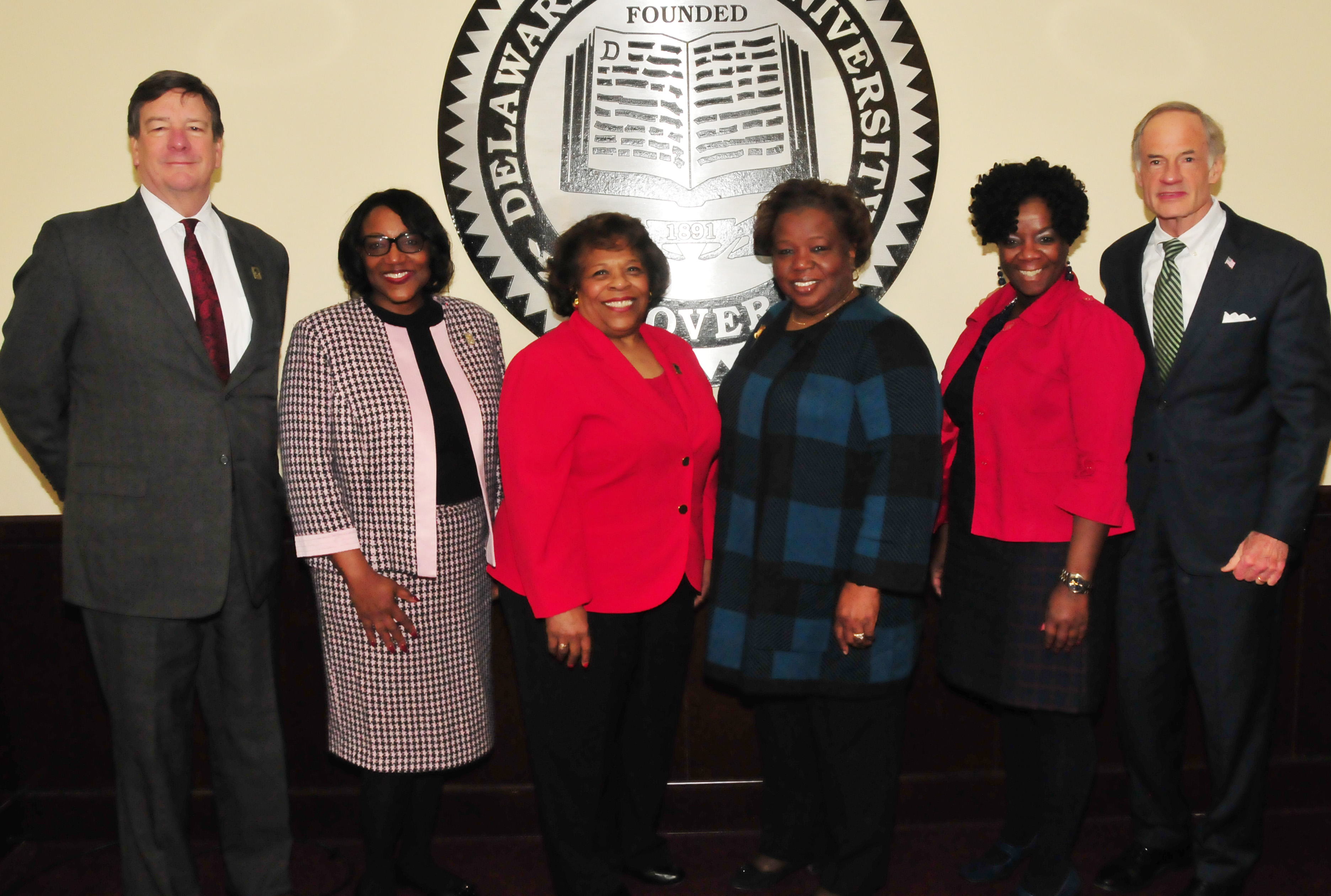 (L-r) Tom Preston, Dr. Vita Pickrum, Dr. Wilma Mishoe, Irene Chapman-Hawkins, Dr. Stacy Downing and Sen. Tom Carper.