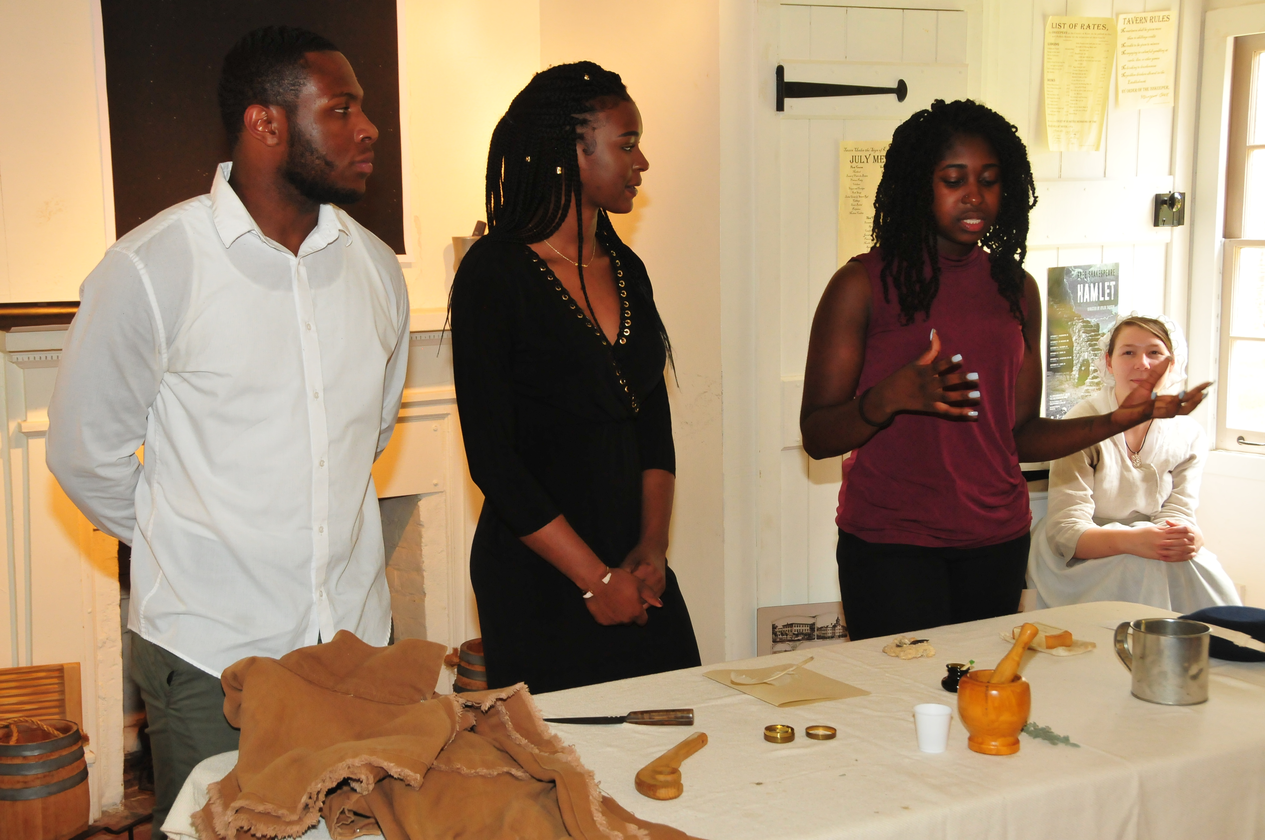 Chase Porter, Aishah Bradley and Jada Wright tell the story of the "Dover Eight" at the John Bell House