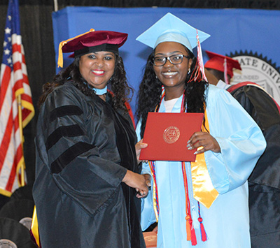 Esther Abiona, 2019 salutatorian, with ECHS Director Dr. Evelyn Edney.