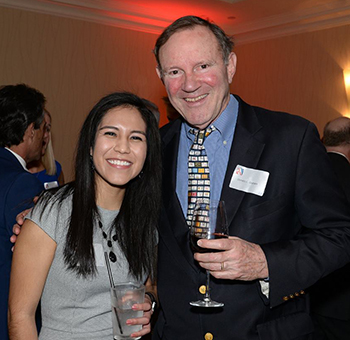 Indira Islas poses with Donald Graham at the ceremony with Donald Graham, the Opportunity Scholarship founder.