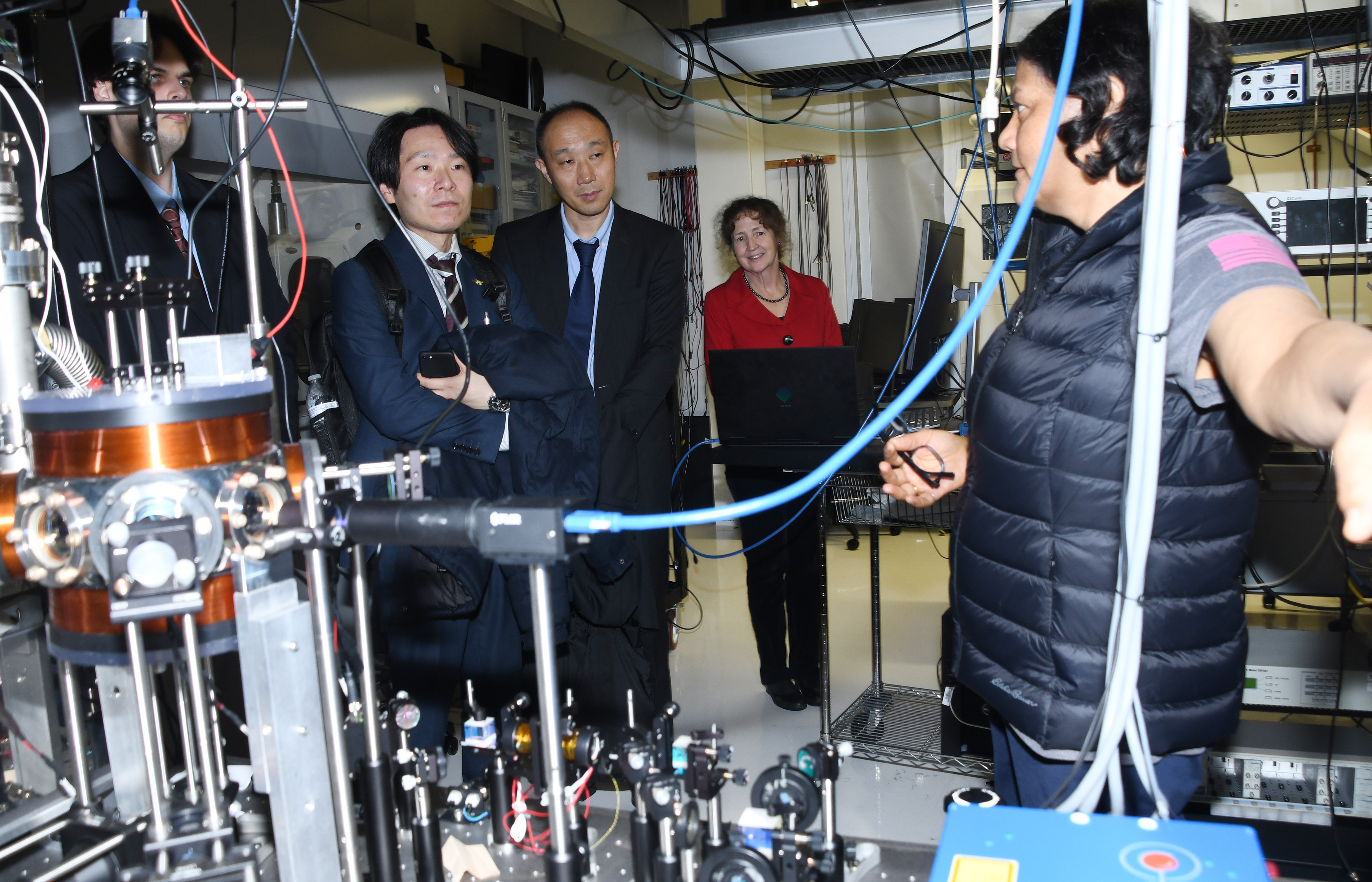 Dr. Renu Tripathi explains her research to the visitor from Miyagi, Japan.