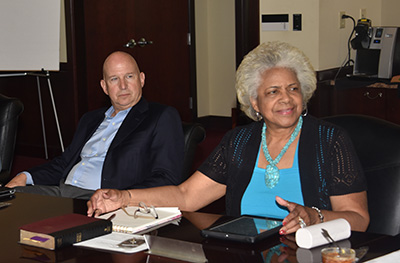 Participating in her first board meeting, new Trustee Esthelda Parker Selby sits next to Trustee Jack Markell.