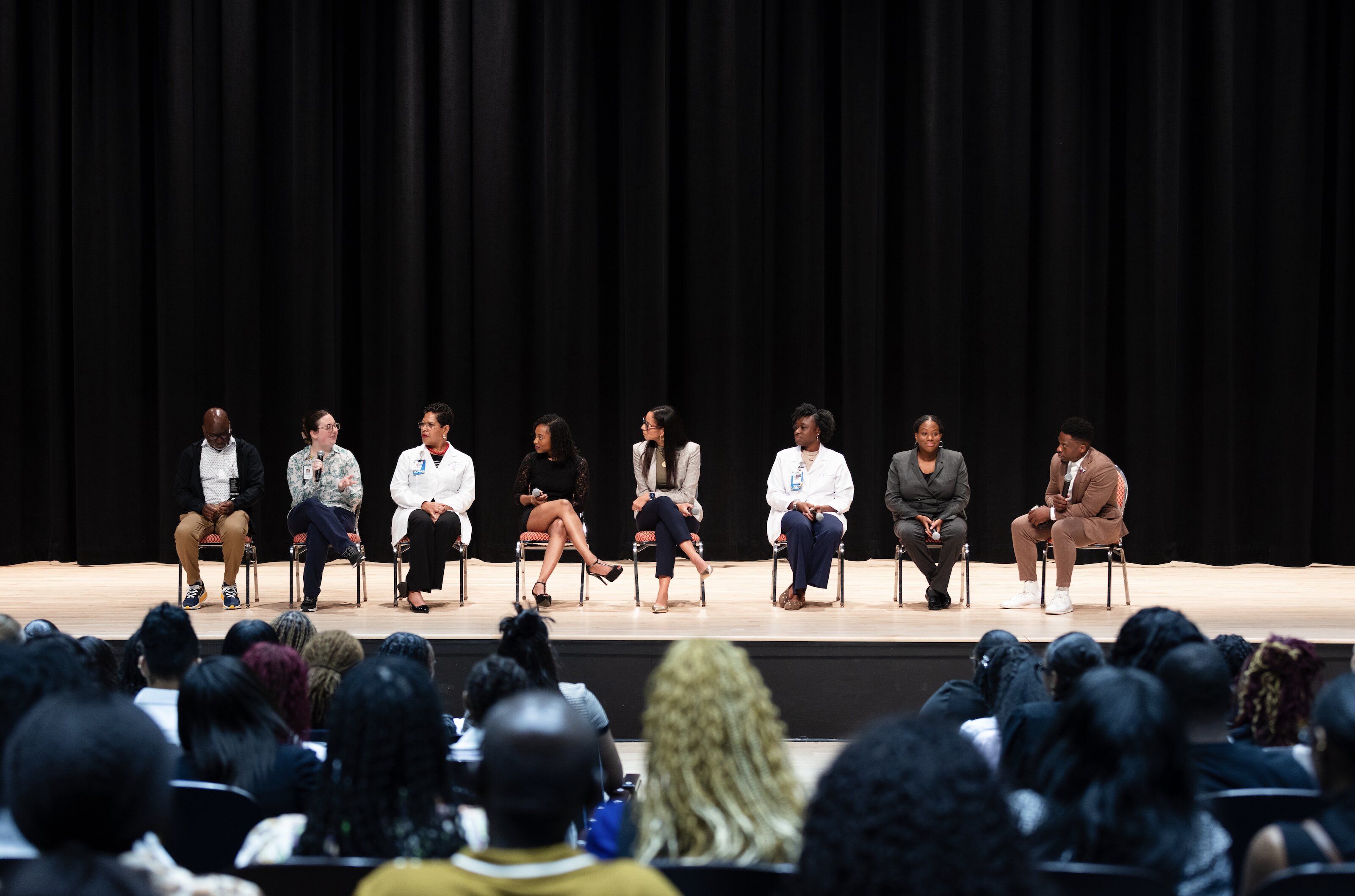 Health care professionals share advice and experiences with DSU students during the White Coat Ceremony panel discussion.