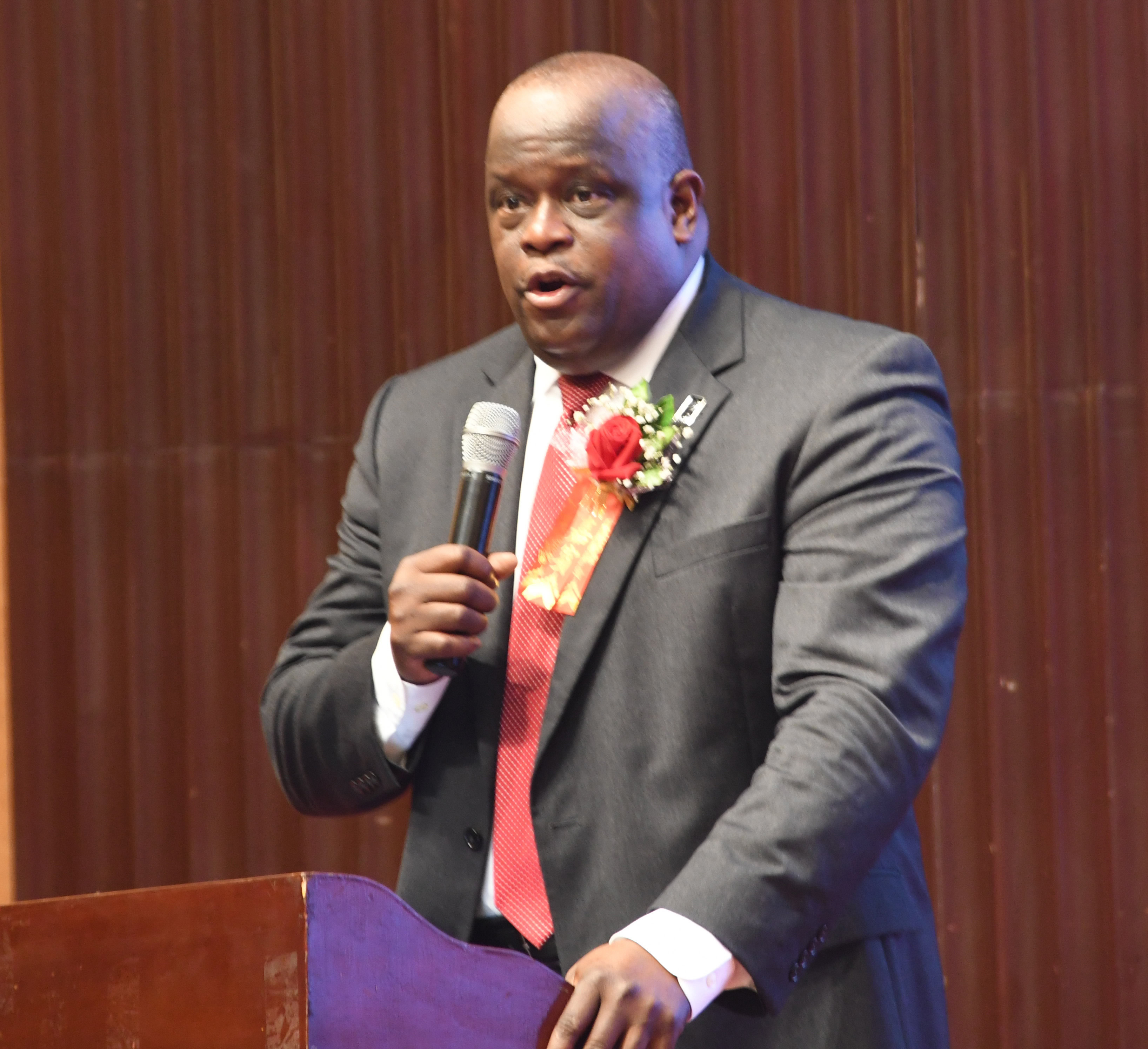 Antonio Boyle speaks to graduating class at the Boya Middle School on June 27.