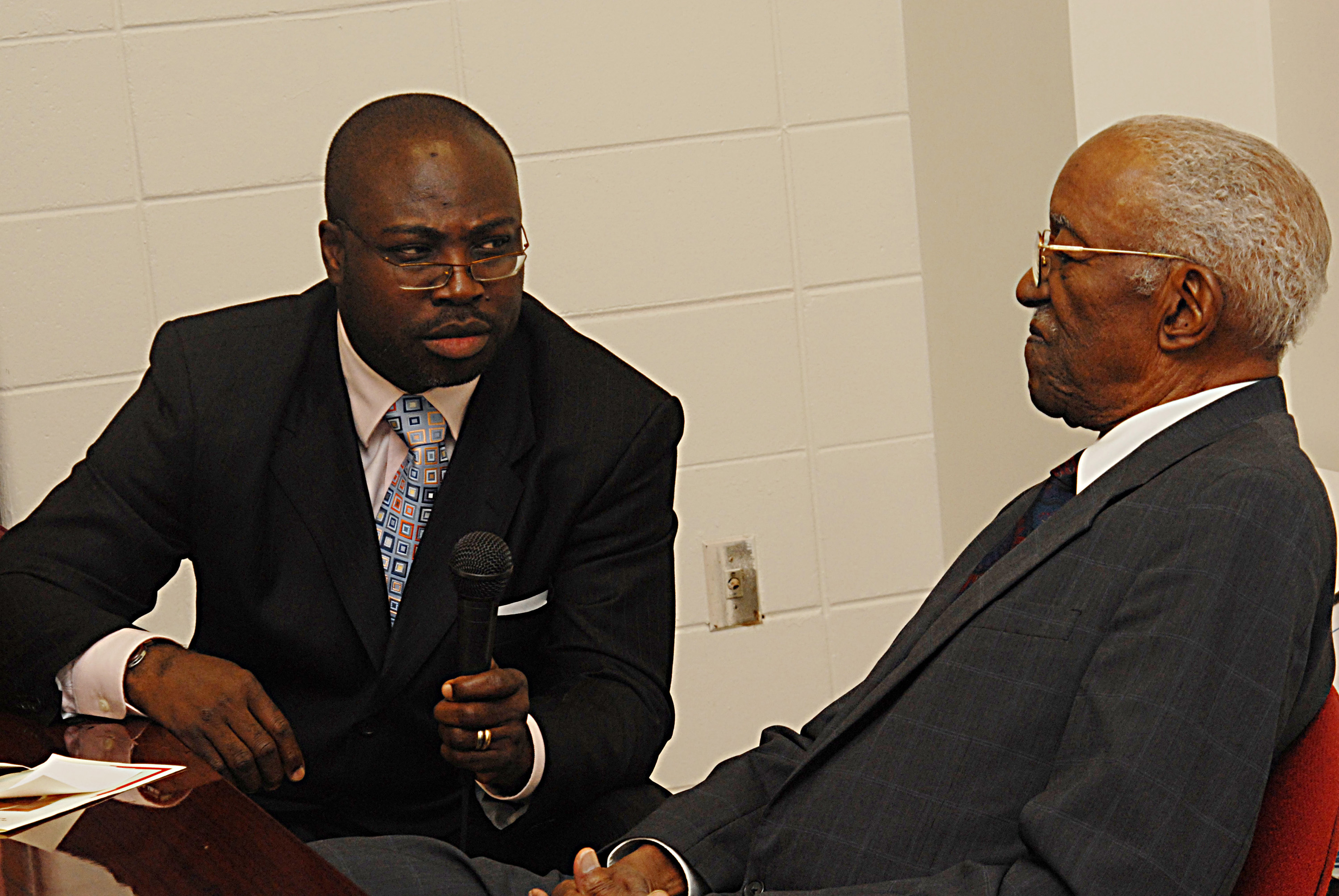 Dr. Akwasi Osei talks with John Hope Franklin, who he was instrumental in bringing to DSU for a guest lecture in 2007.