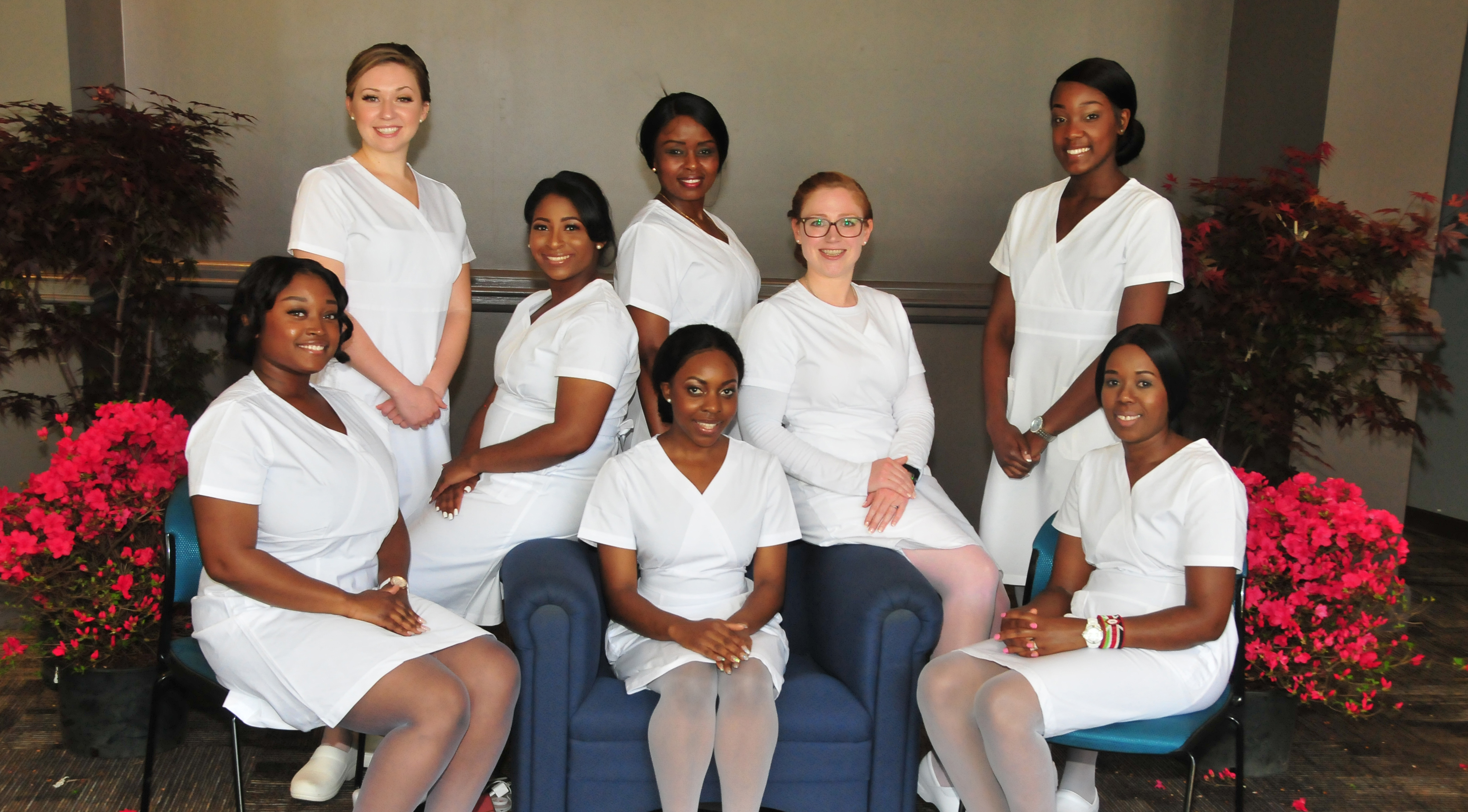 DSU Department of Nursing's Class of 2018: (l-r) Alexis Sudler, Idalis Stamas, Breanna Clinton, Jadidah Gatheri (standing), Emmanuella Che (seated), Katherine Groves, Kayla Nelson and Mary Muthini.