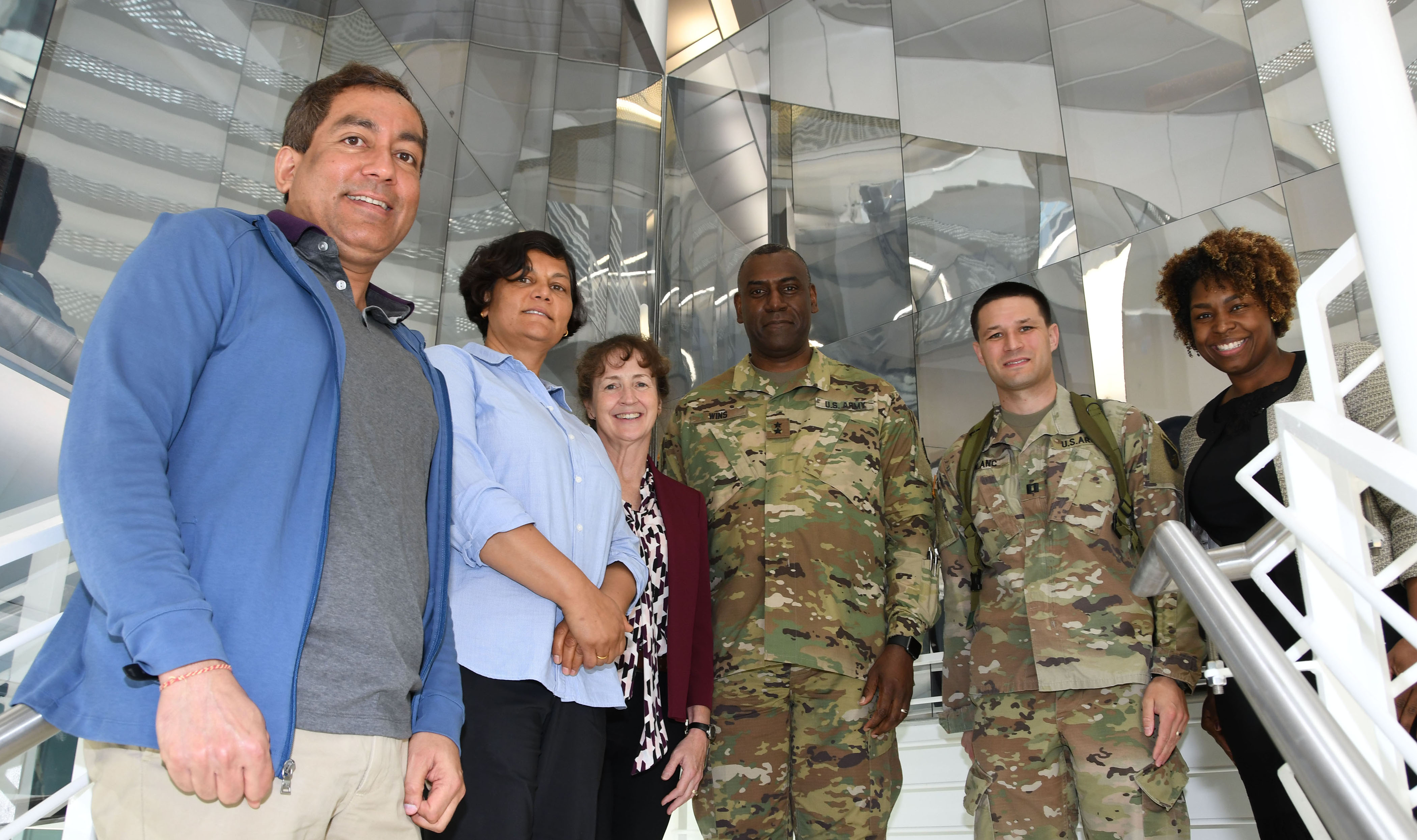 (L-r) DSU's Dr. Gour Pati, Dr. Renu Tripathi, Dr. Melissa Harrington with Maj. Gen. Cedric Wins, commanding general of the U.S. Army Research Development Engineering Command, along with his staff Capt. Joshua Blanc and Dr. Patrice Collins, who earned her Ph.D. at DSU.