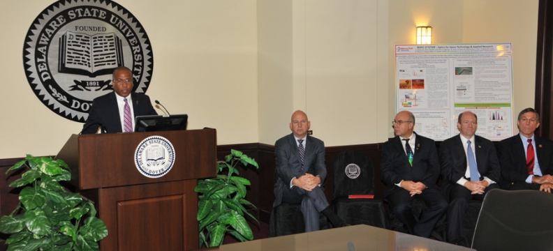  DSU President Harry L. Williams announces the $1.2 million grant awarded to the University by the Bill &amp; Melinda Gates Foundation as Gov. Jack Markell, Dr. Noureddine Melikechi, U.S. Sen. Chris Coons and U.S. Rep. John Carney listen during a Oct. 26 media event.