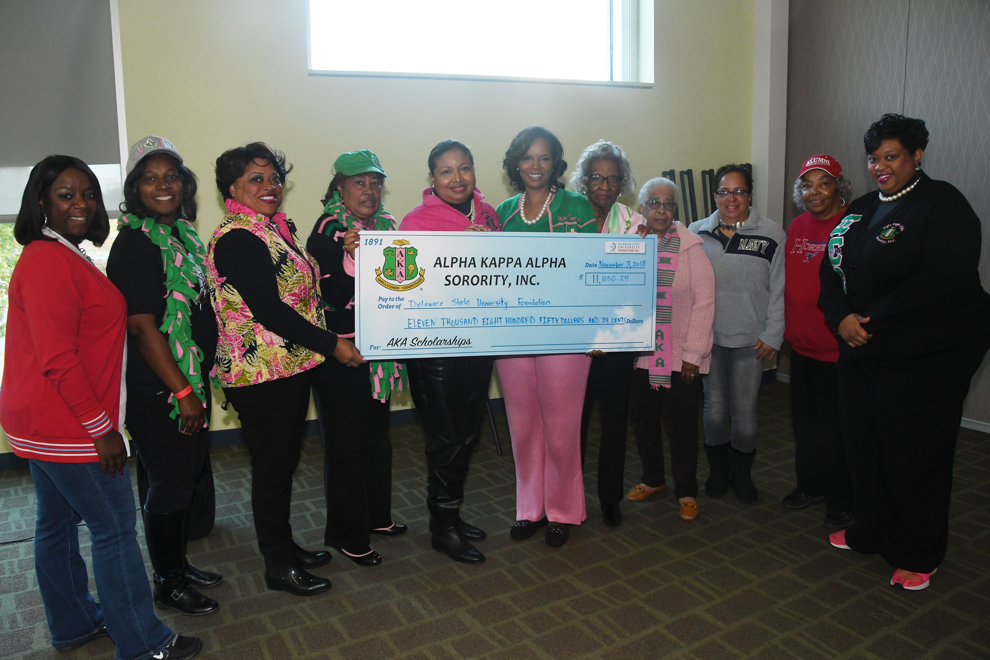 Alpha Kappa Alpha members representing Delaware chapters in Wilmington, Newark and Dover, came together to present a scholarship donation of more than $11,850 to the University.