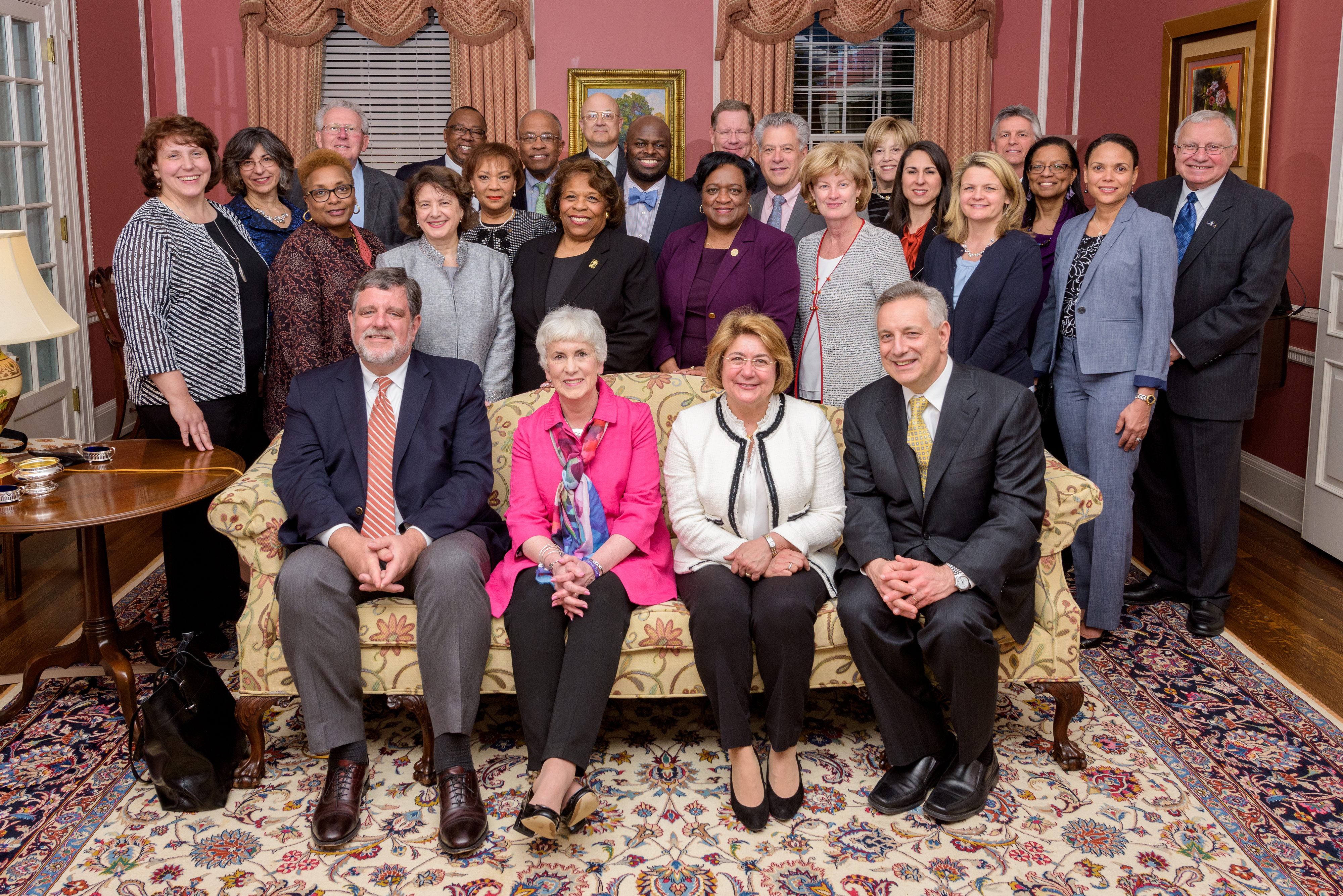 University President Wilma Mishoe and Provost Tony Allen (both in standing center) pose with other presidents and administrators whose institutions are a part of the Campus Compact Mid-Atlantic. During a Nov. 8 ceremony, the Compact presented Dr. Allen with its Civic Leadership Award.