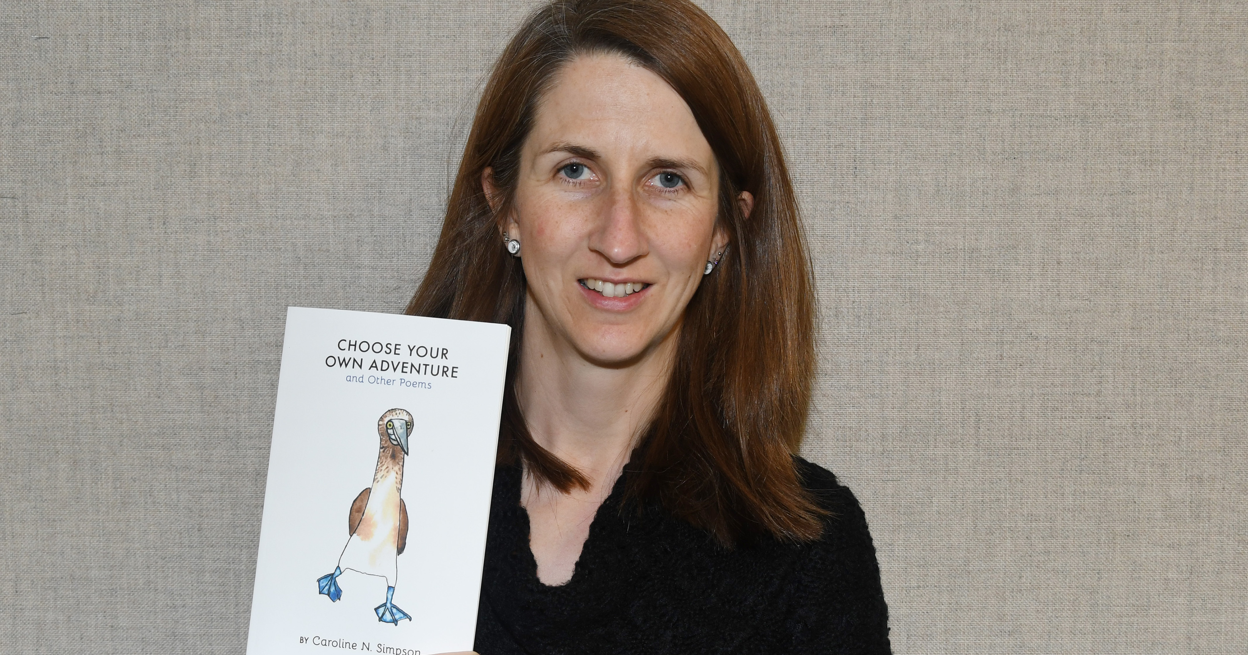 Caroline Simpson, an adjunct assistant professor, has published a book of poems inspired by her trip to the Galapagos Islands.
