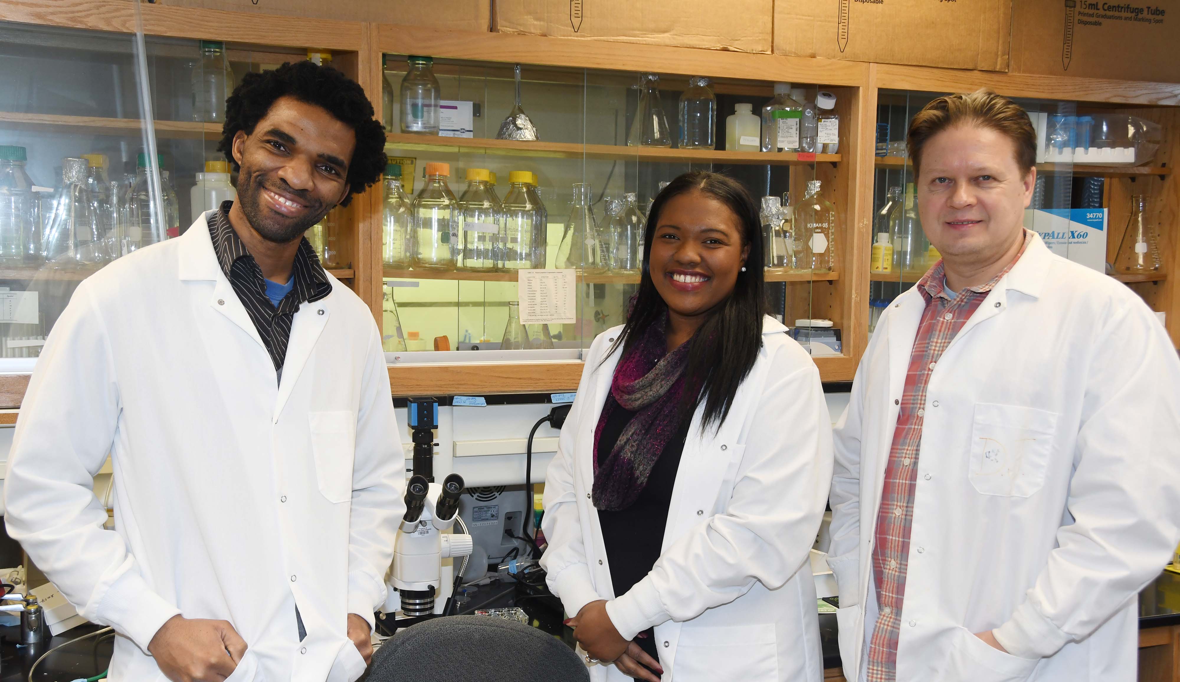 (L-r) Dr. Hakeem Lawal, associate professor of biological sciences, and the awardees Shardae Showell and Sergei Grigoryev, both first-place winners in their respective categories. Not pictured is a third-place winner, Liam Joseph.