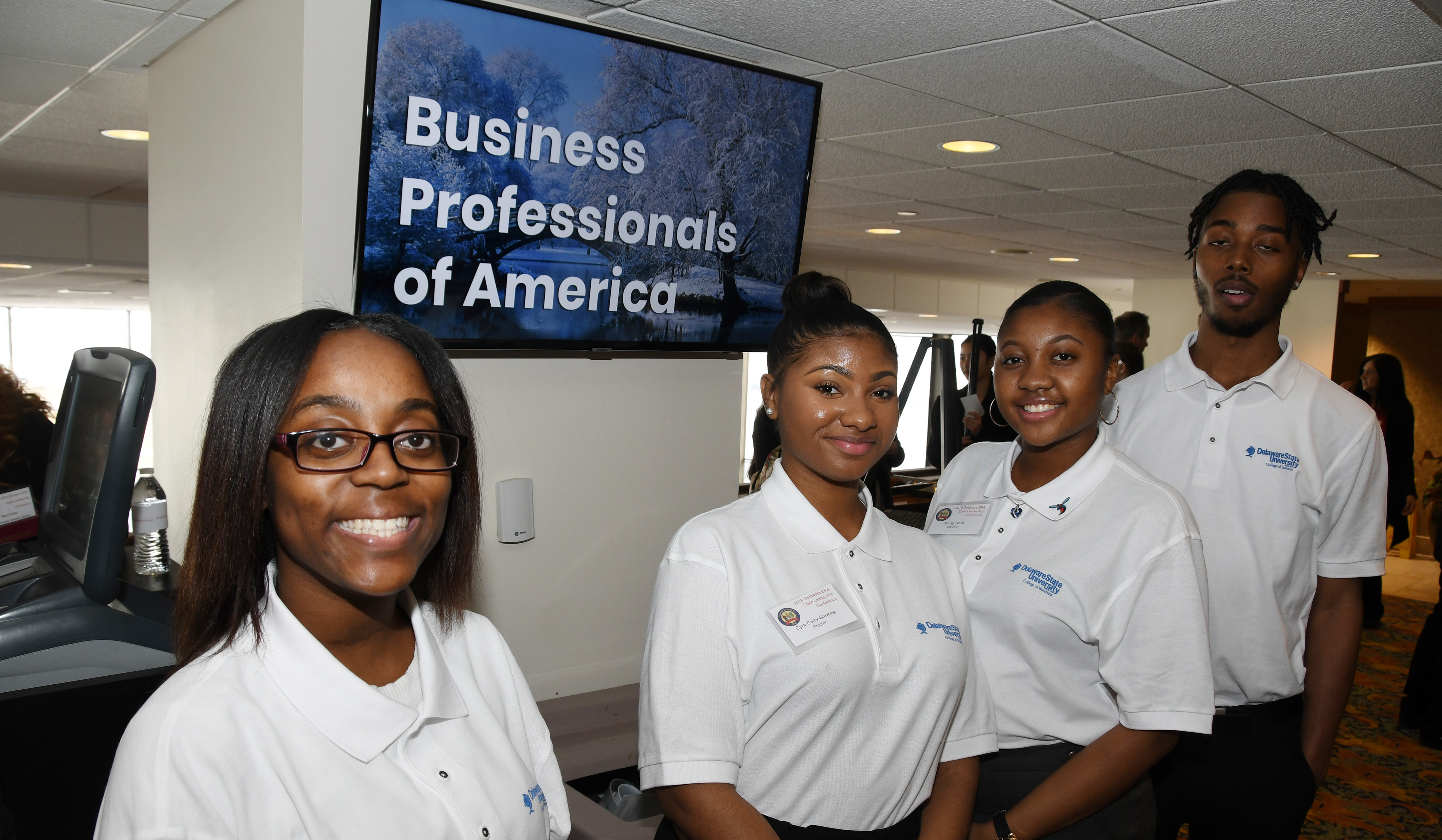 (L-r) University students Charlyeshia Jones, Trinity Savis, Tyra Curry-Stevens and Marvin Hagwood were among the 90 Delaware State University students who volunteered as proctors for the Delaware Business Professionals of America Leadership Conference held at Dover Downs Hotel and Casino Feb. 26-27.