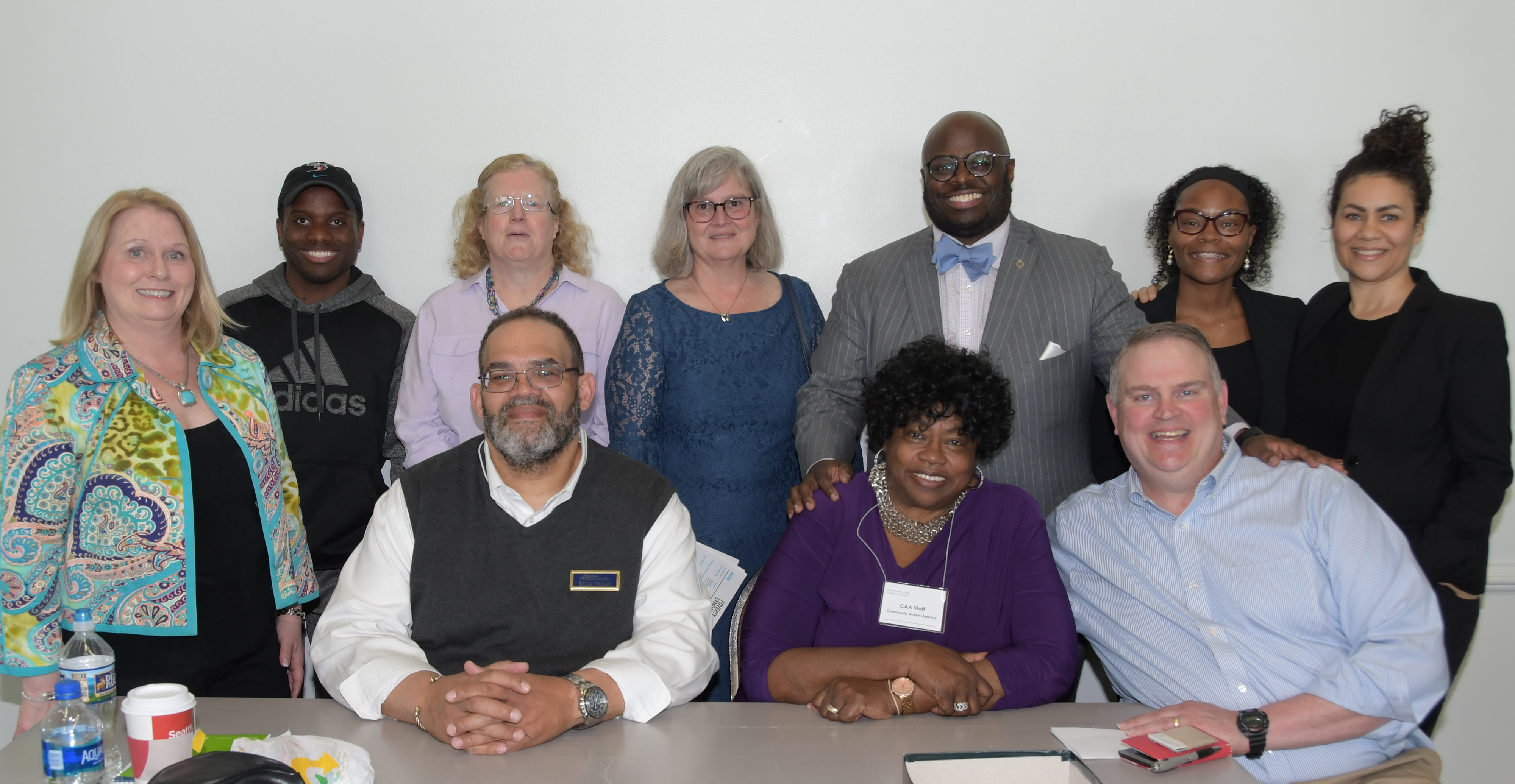 Poverty Symposium leaders: (seated l-r) Bruce Wright and Bernice Edwards of First State Community Action, state Sen. Colin Bonini; (standing l-r) Cynthia Pritchard of Philanthropy Delaware, University student Rex Haye, University Social Work Dept. chair Dr. Kelly Ward, University Psychology Dept. chair Dr. Dorothy Dillard, Provost Tony Allen, keynote speaker Lillian Singh and Kat Goughnour, both of Prosperity Now.