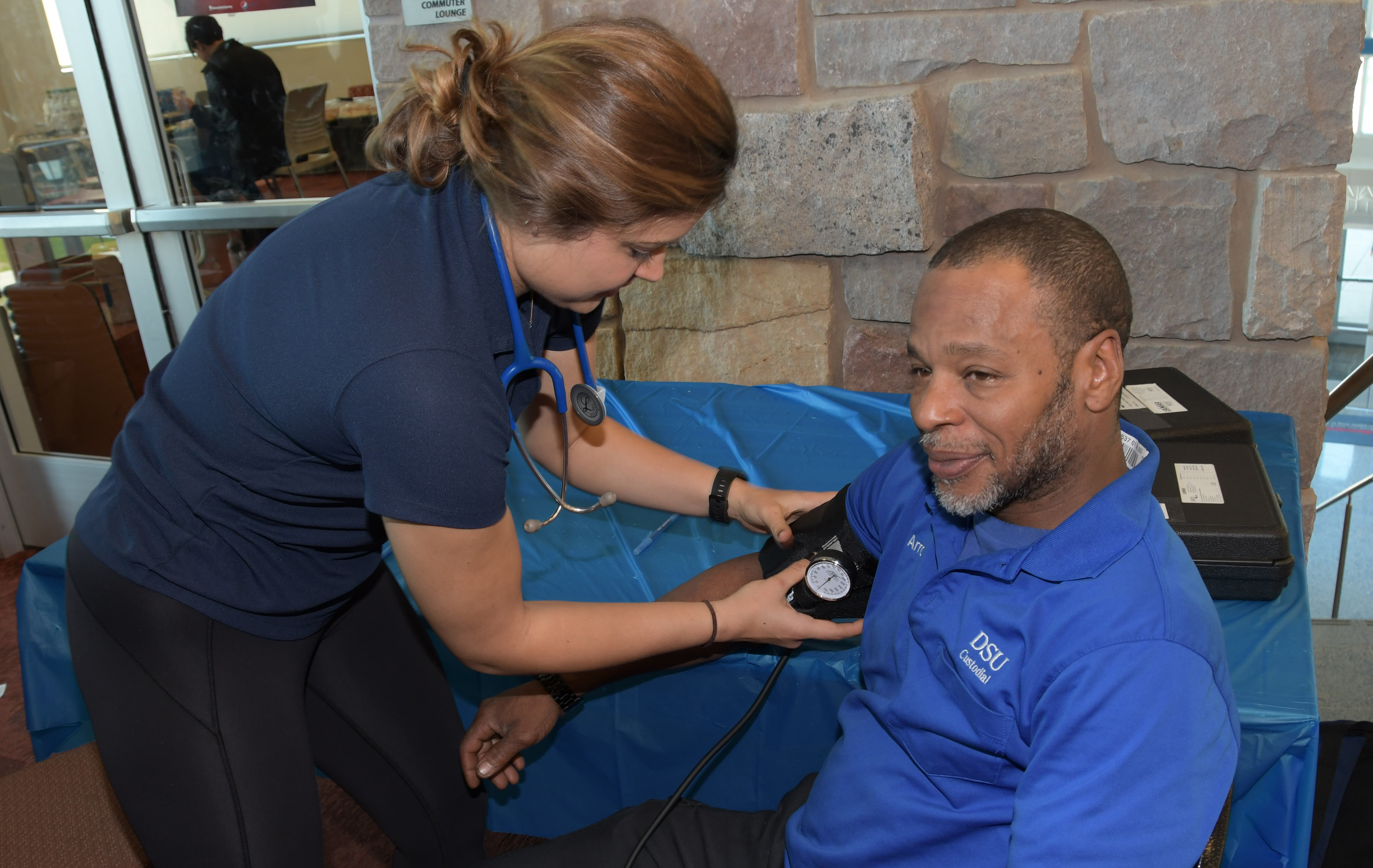 One of DSU valued custodian Arron Brown takes a break to get his blood pressure check during the activities at the Public Health and Fitness Leaders' Day in the MLK Jr. Student Center.