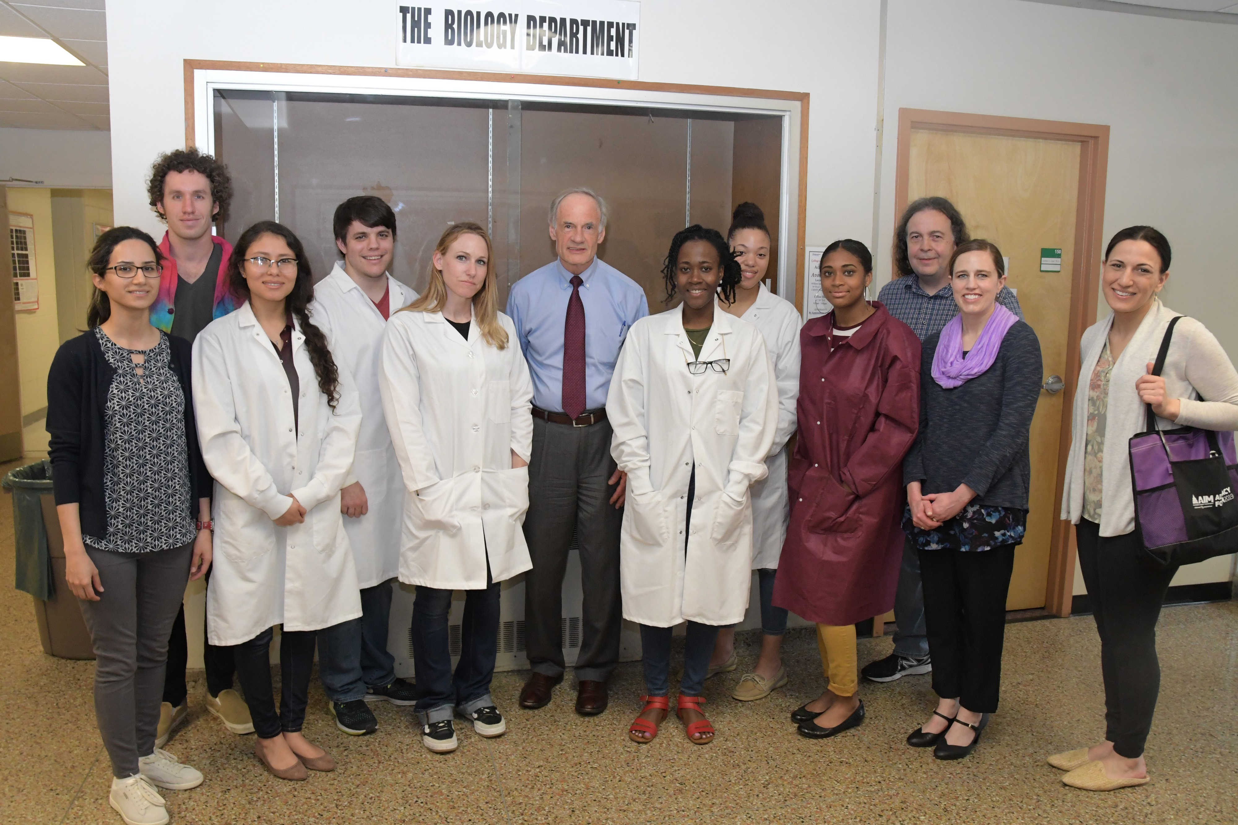 U.S. Sen. Tom Carper poses with University faculty and students along with representatives of the Delaware Valley Chapter of the Alzheimer's Association during an April 19 visit to the campus.