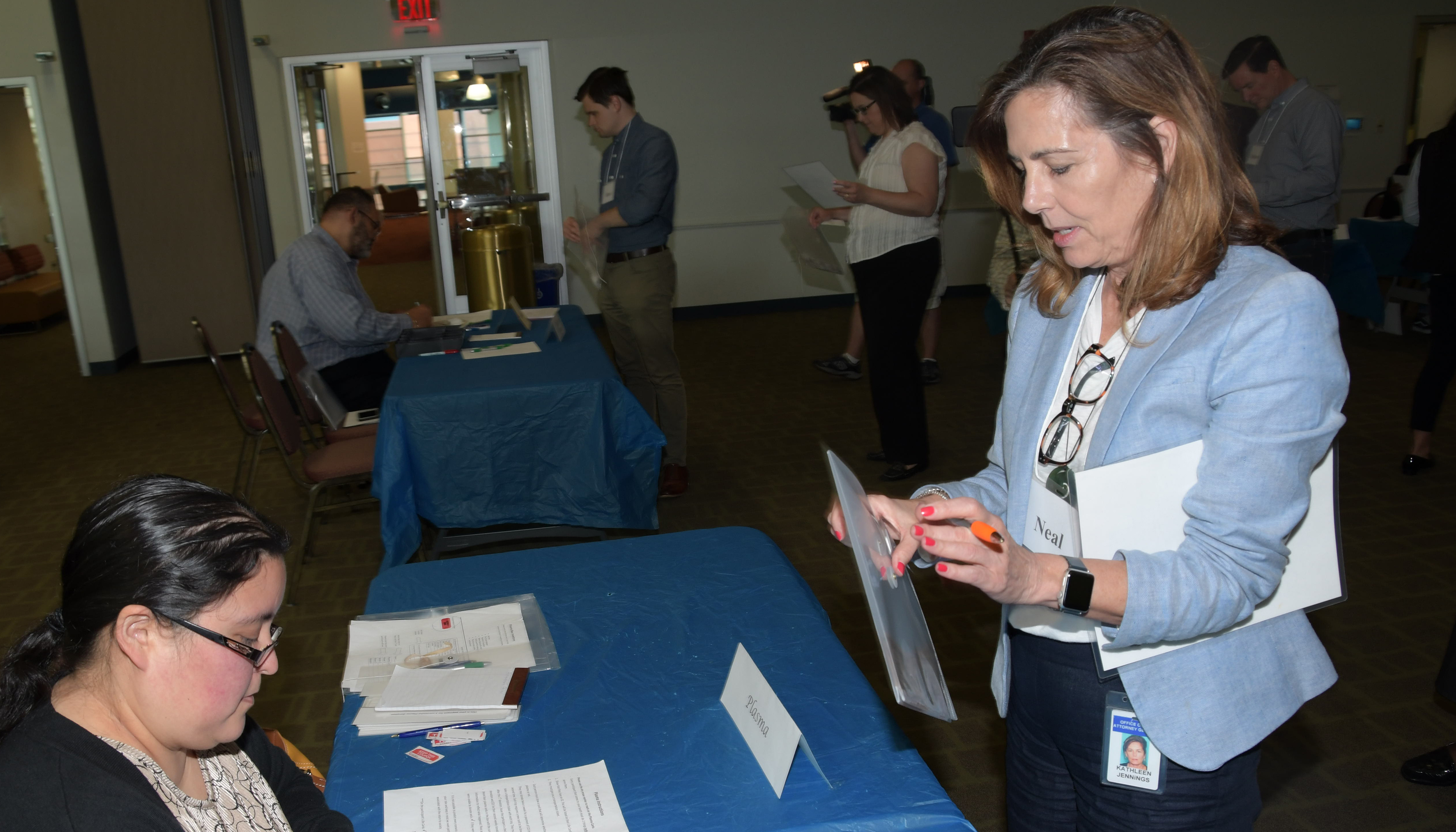 State Attorney General Kathleen Jennings attempts to sell her plasma during the Re-entry Simulation held at Delaware State University.