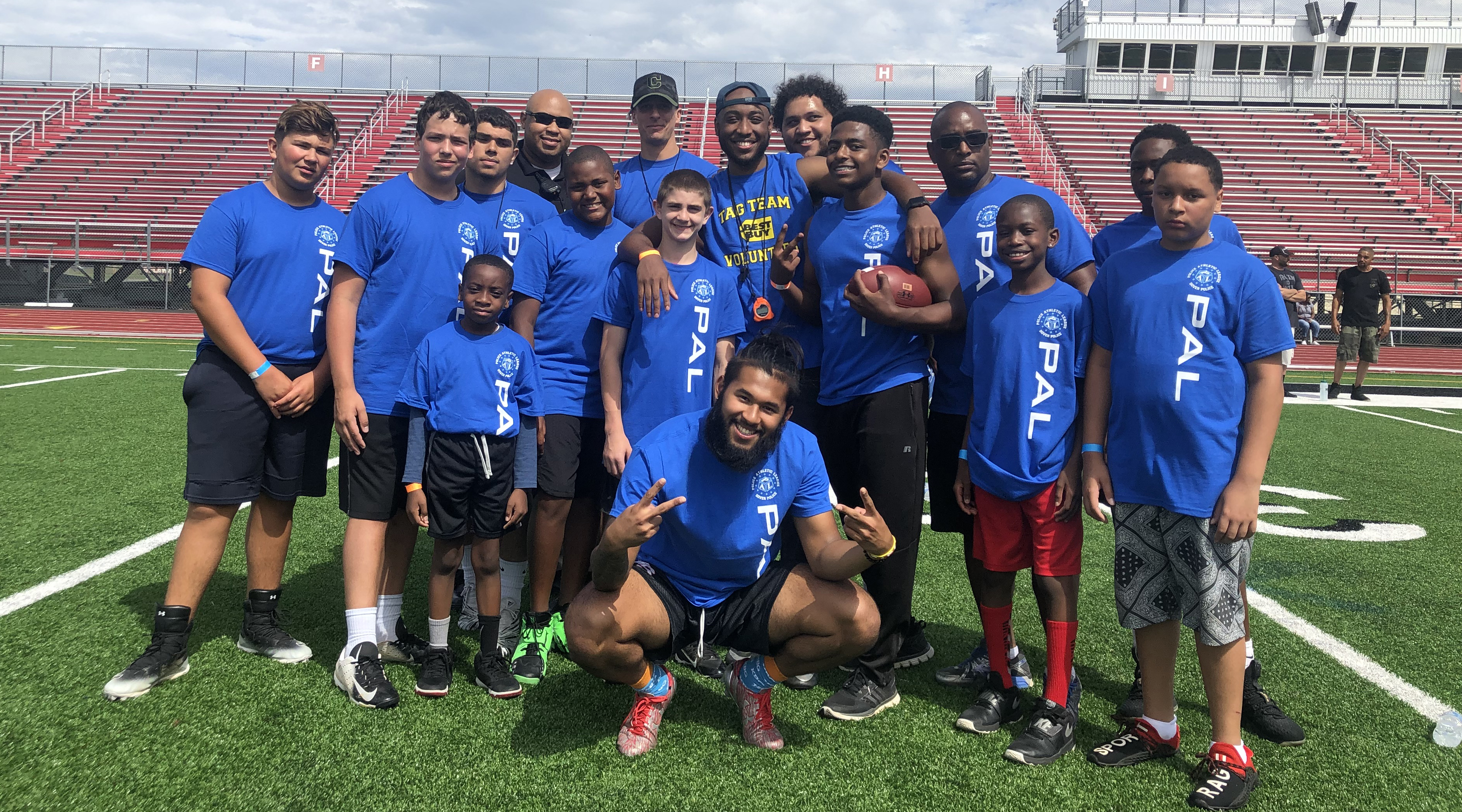 Police officers from Delaware State University and the Dover Police Athletic League came together for the 2nd Annual Youth Football Combine held at Alumni Stadium.