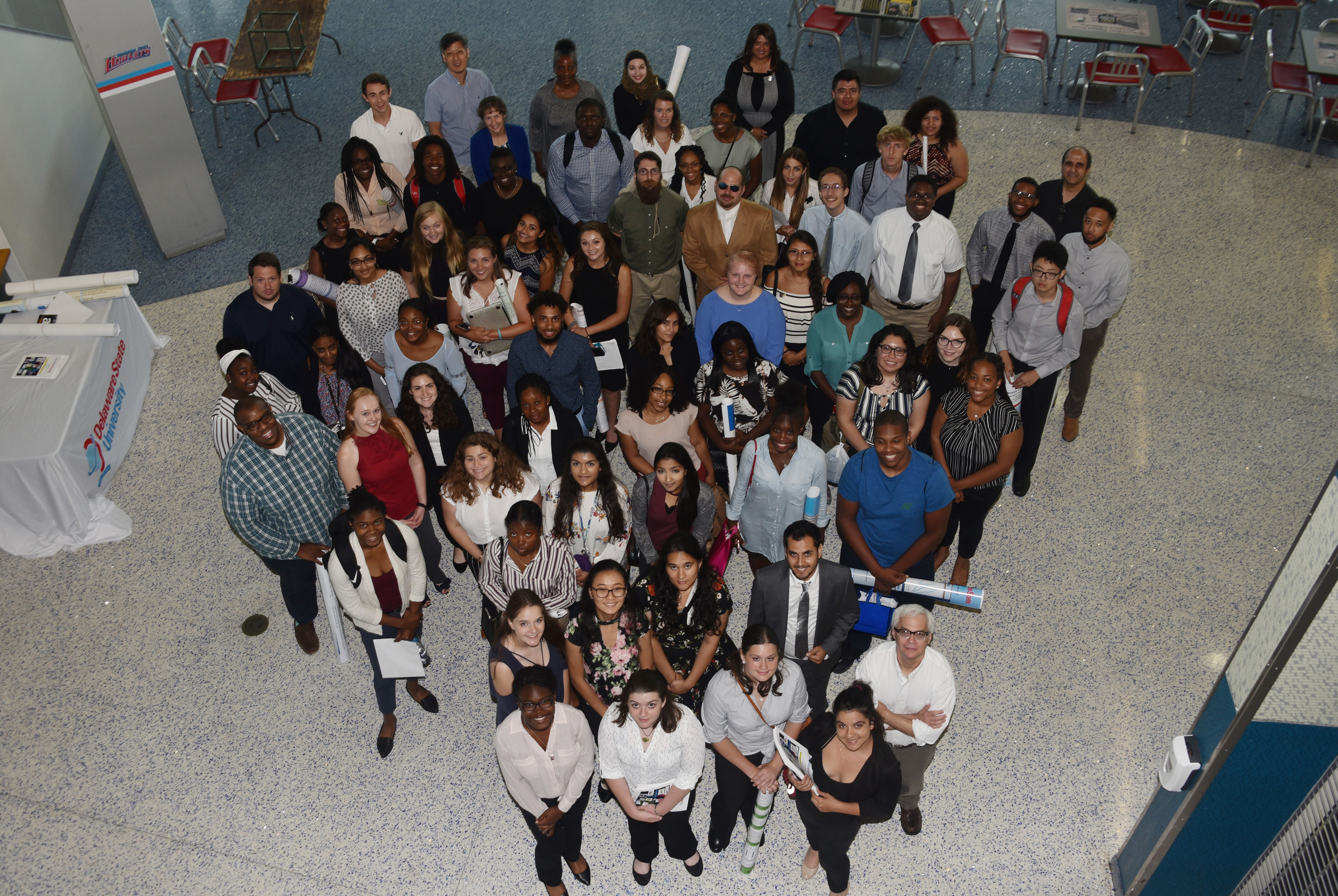 The 2019 Summer Research Symposium participants pose for a group shot at the end of the July 26 event.