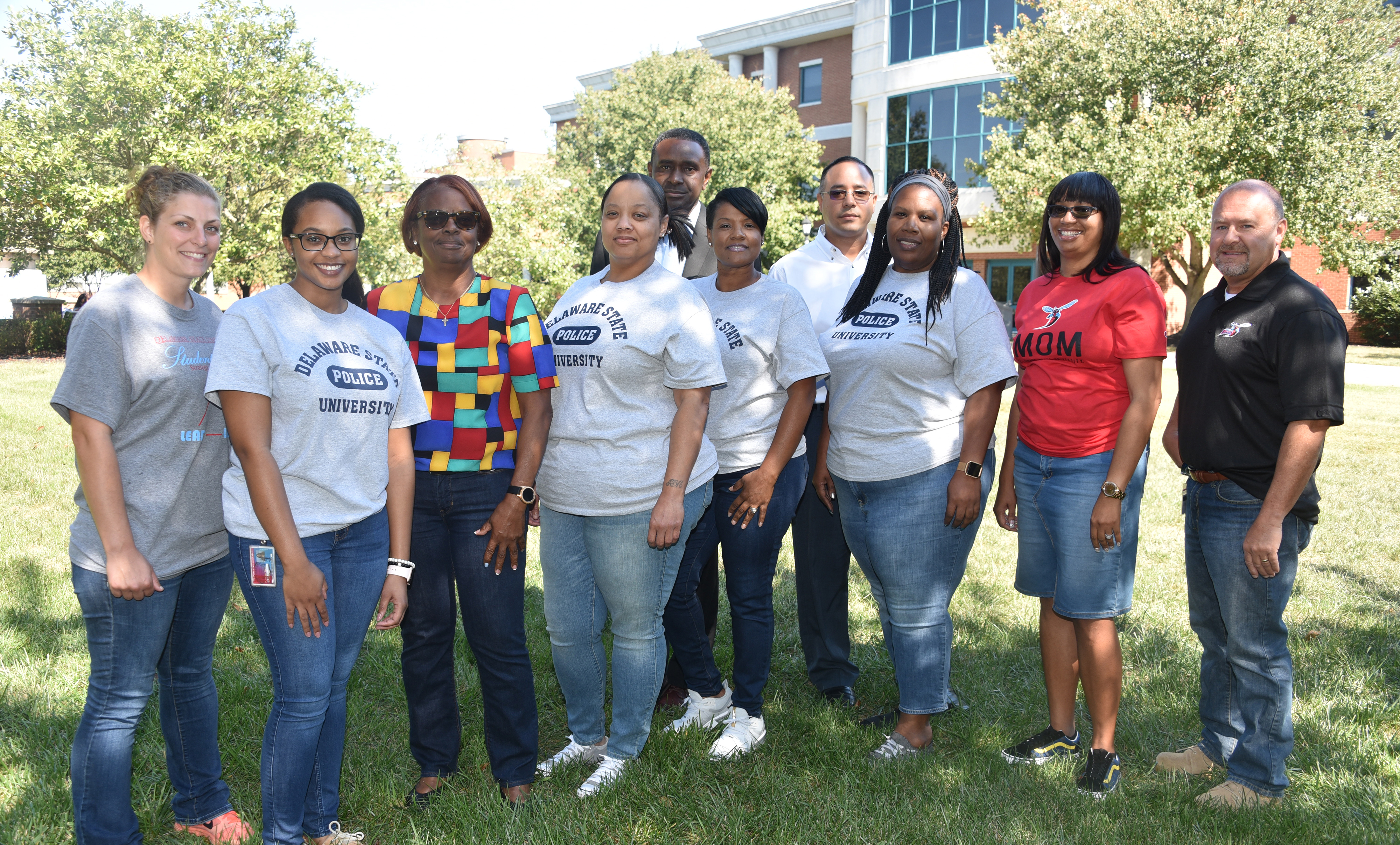 Members of the University Police Department show off their jean fashion statement in observance of "Denim Day", as part of Sexual Assault Awareness Day on Sept 25.